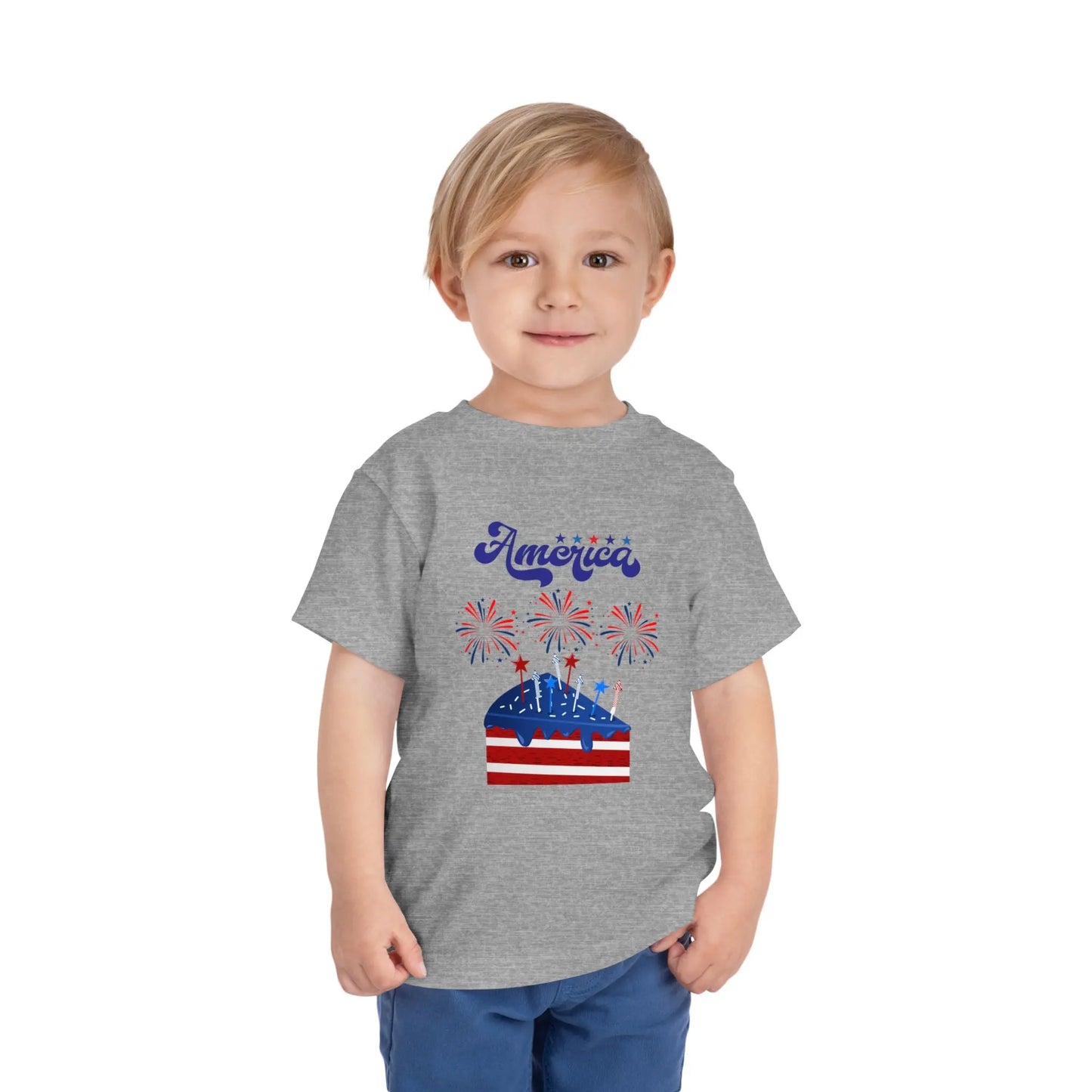 Celebrate Independence Day in style! Soft, print-on-demand 4th of July toddler tee featuring a festive flag cake and fireworks design. Sizes 2T–5T. Athletic Heather