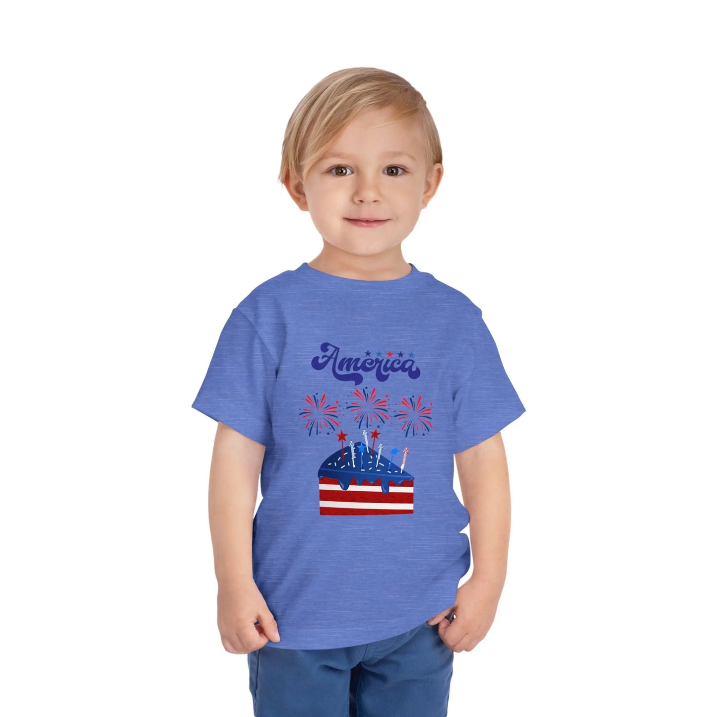 Celebrate Independence Day in style! Soft, print-on-demand 4th of July toddler tee featuring a festive flag cake and fireworks design. Sizes 2T–5T. Heather Columbia Blue