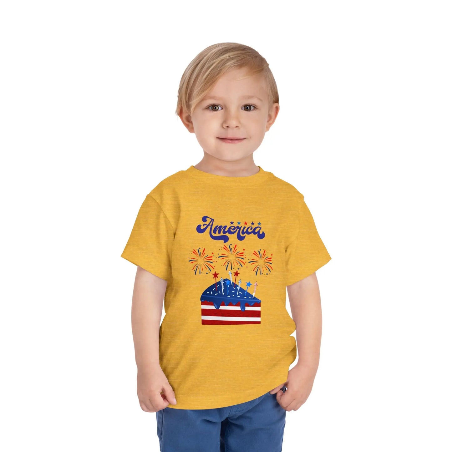 Celebrate Independence Day in style! Soft, print-on-demand 4th of July toddler tee featuring a festive flag cake and fireworks design. Sizes 2T–5T. Heather Yellow Gold