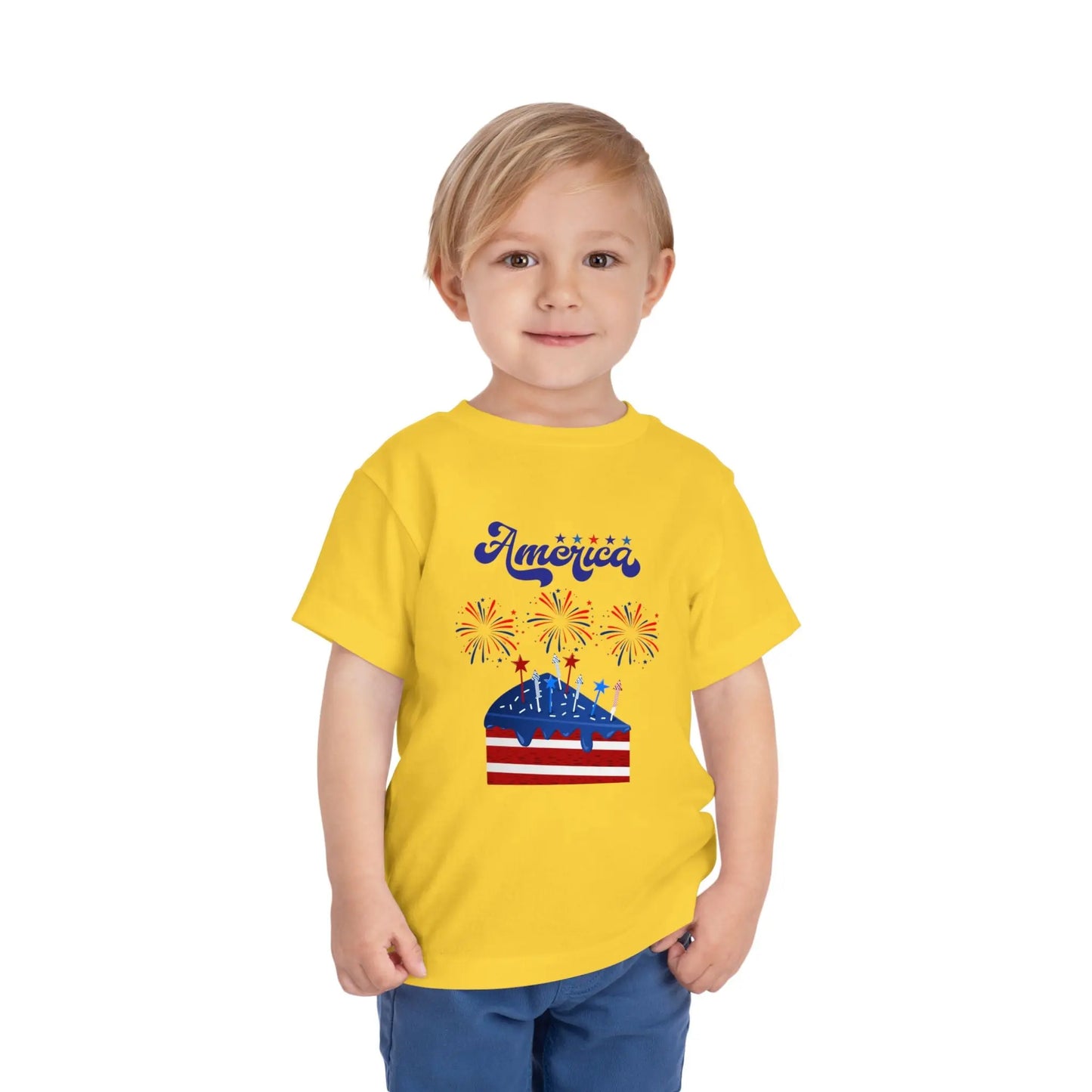 Celebrate Independence Day in style! Soft, print-on-demand 4th of July toddler tee featuring a festive flag cake and fireworks design. Sizes 2T–5T. Yellow