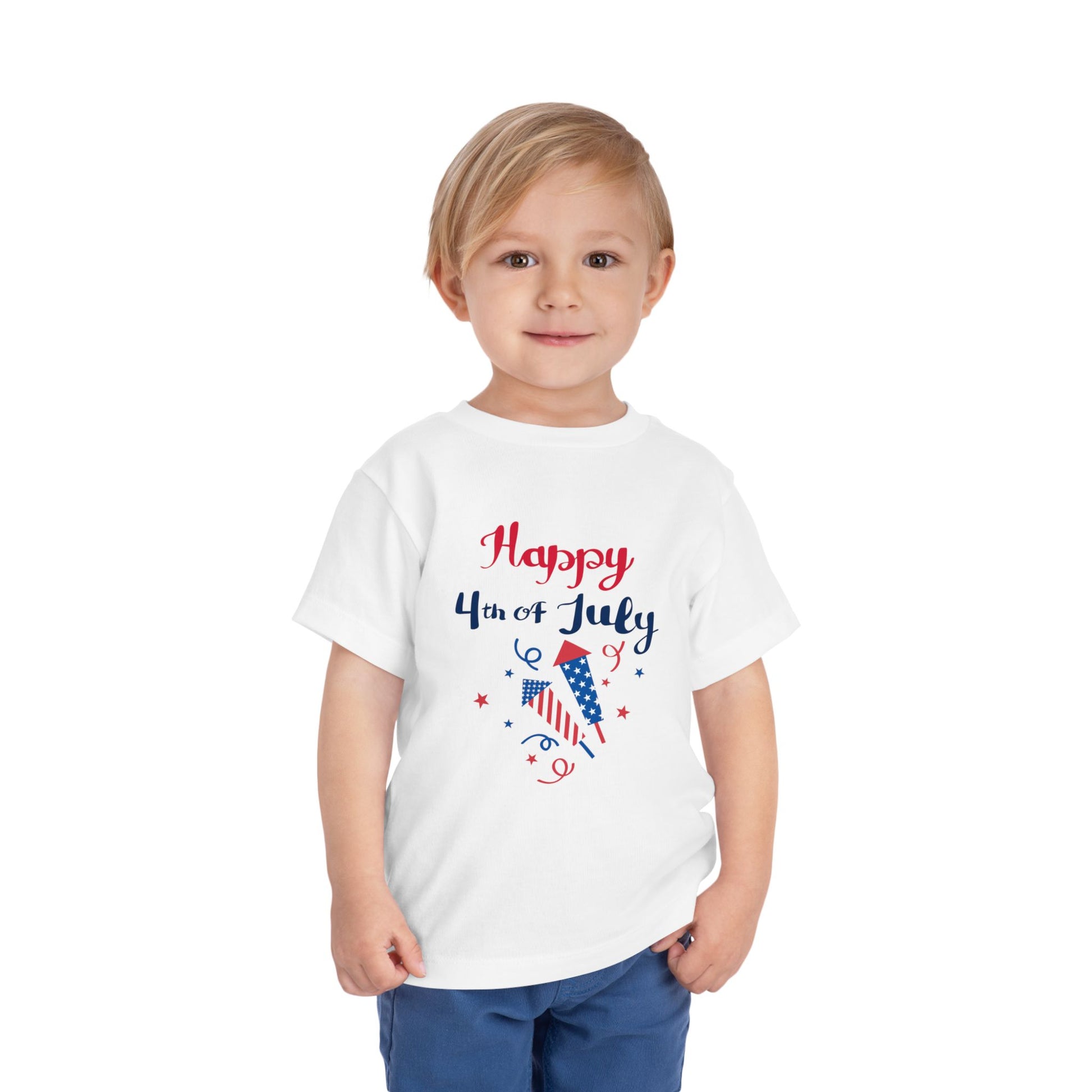 Soft, lightweight patriotic tee for toddlers 2T–5T. Perfect for 4th of July barbecues and parades. Red, white & blue firecracker design kids will love. White