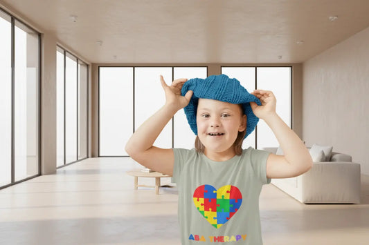 toddler wearing an Autism Awareness t shirt honoring neurodiversity with this "A Different Kind of Ability" autism awareness toddler tee. Featuring a puzzle heart design, it's a meaningful shirt for little ones. 