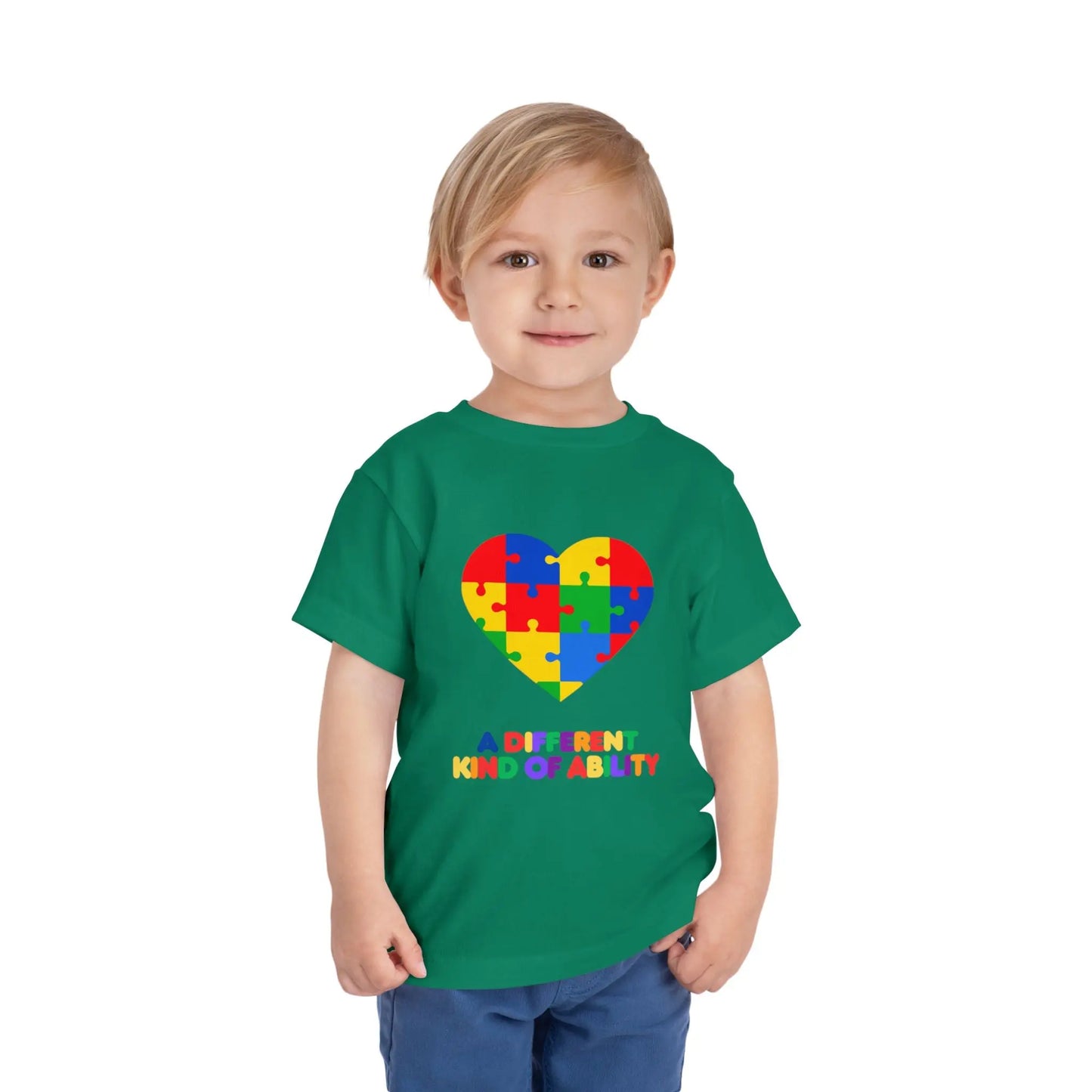 Toddler wearing an Autism Awareness t shirt honoring neurodiversity with this "A Different Kind of Ability" autism awareness toddler tee. Featuring a puzzle heart design, it's a meaningful shirt for little ones. Kelly Green