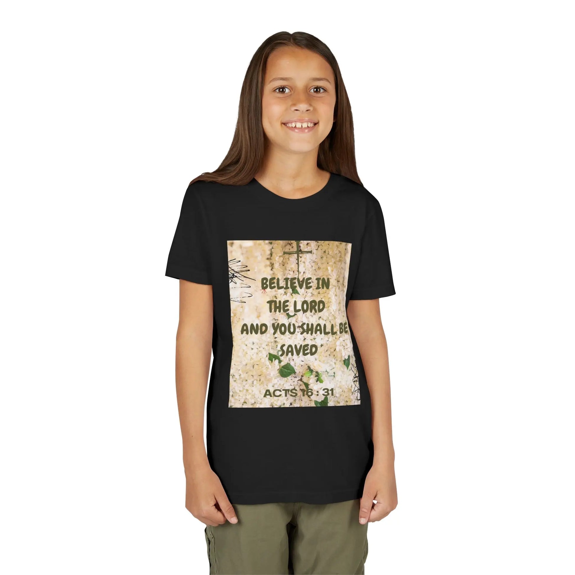 Youth wearing a soft, faith-filled youth tee featuring Acts 16:31 — "Believe in the Lord and you shall be saved." A meaningful Christian kids shirt for church, Sunday. Black