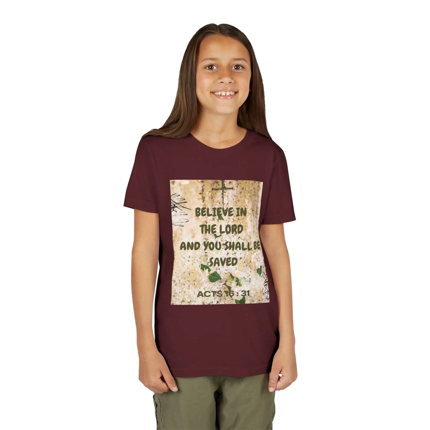 Youth wearing a soft, faith-filled youth tee featuring Acts 16:31 — "Believe in the Lord and you shall be saved." A meaningful Christian kids shirt for church, Sunday. Maroon