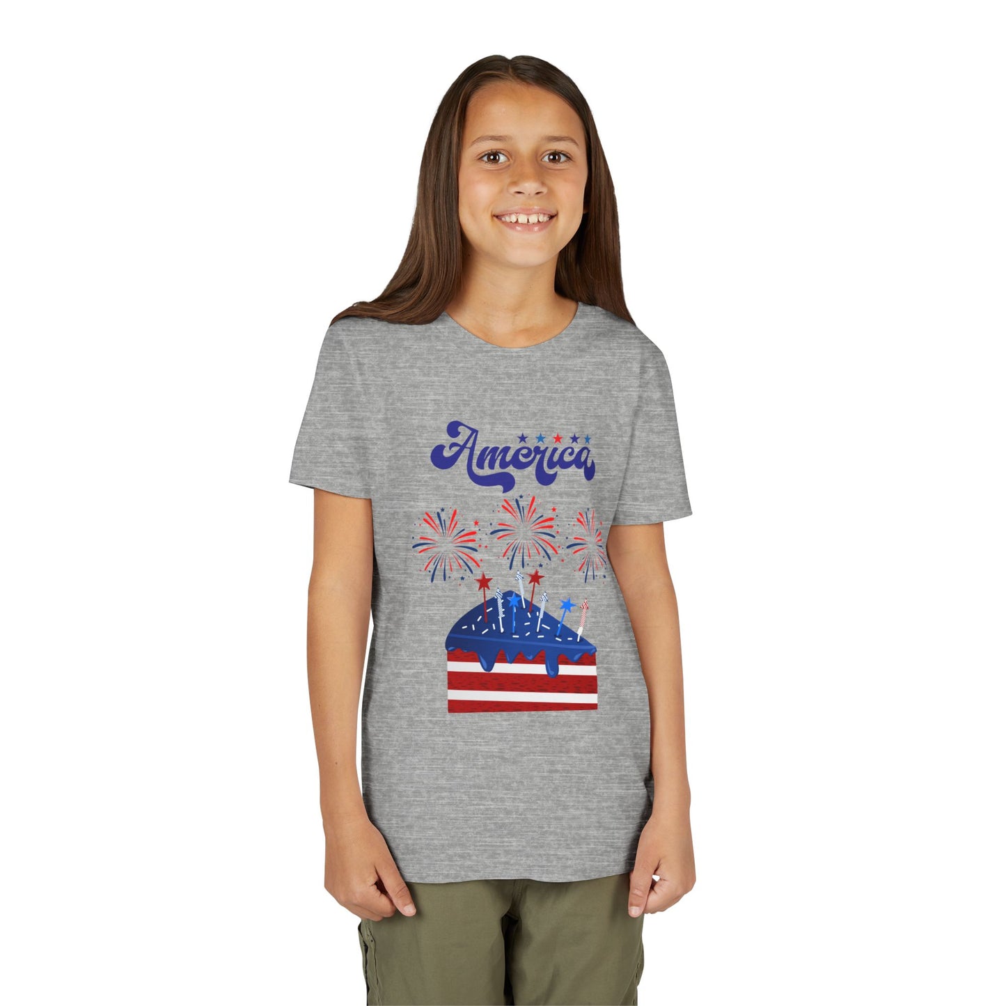 Girl wearing an Athletic Heather t-shirt with 'America' and patriotic graphics on a white background. Celebrate the 4th of July in style! This patriotic America fireworks youth tee is perfect for kids who love Independence Day festivities and summer fun.