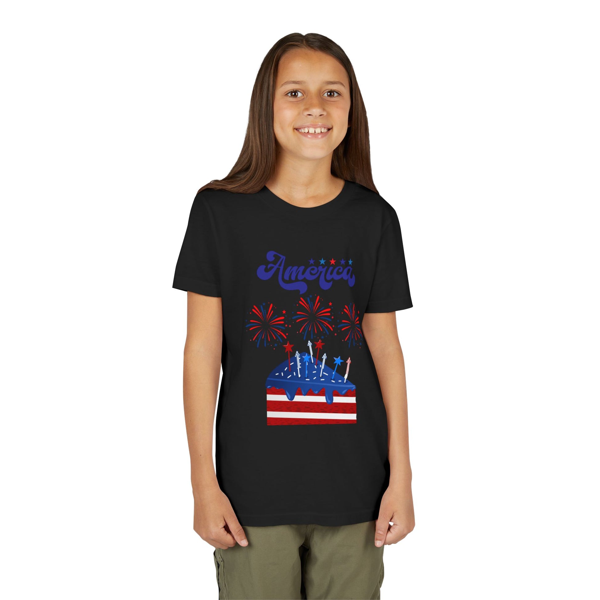 Young girl wearing a Black t-shirt with a patriotic design on a white background. Celebrate the 4th of July in style! This patriotic America fireworks youth tee is perfect for kids who love Independence Day festivities and summer fun.