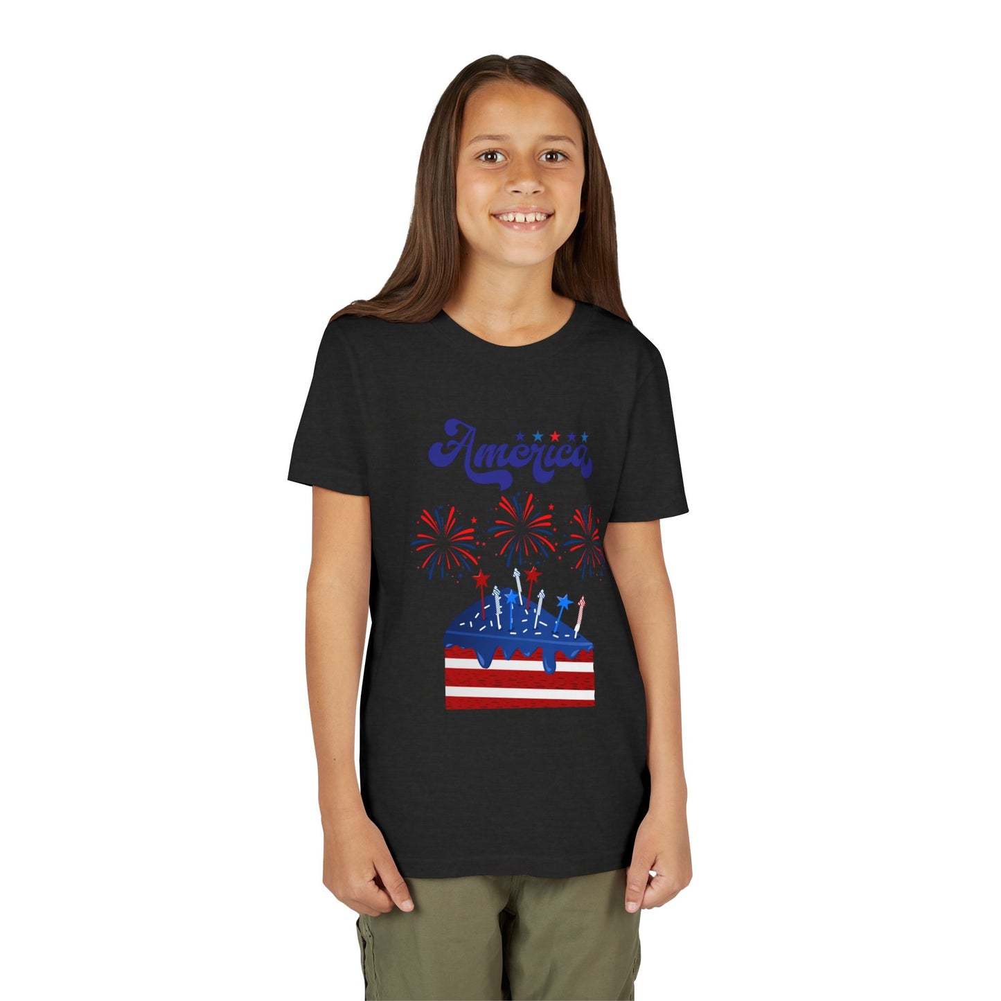 Young girl wearing a Heather Black t-shirt with a patriotic design on a white background. Celebrate the 4th of July in style! This patriotic America fireworks youth tee is perfect for kids who love Independence Day festivities and summer fun. 