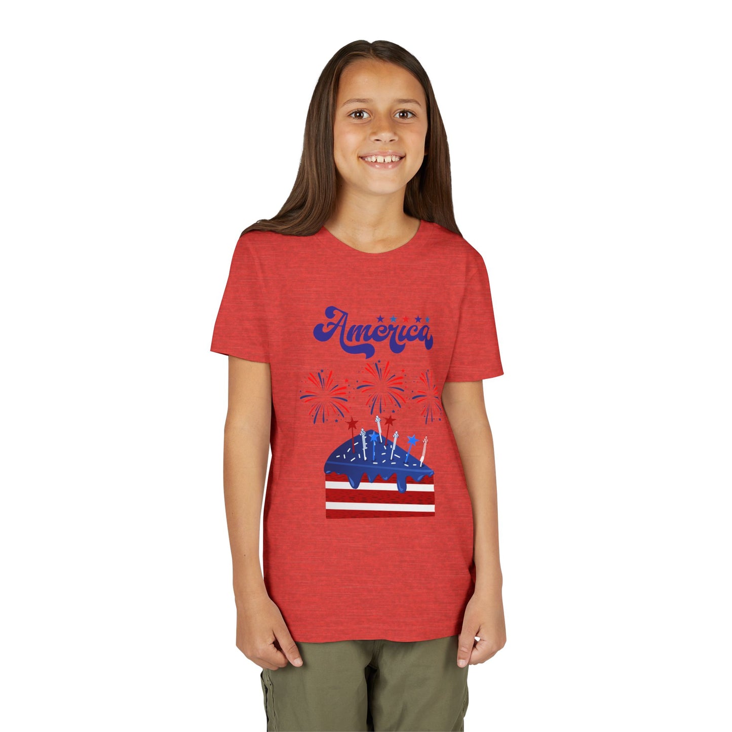 Girl wearing a Heather Red t-shirt with 'America' and American flag design on a white background. Celebrate the 4th of July in style! This patriotic America fireworks youth tee is perfect for kids who love Independence Day festivities and summer fun.