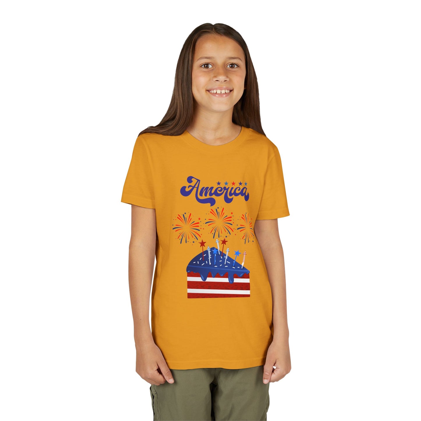 Girl wearing a Mustard yellow t-shirt with a graphic design on a white background. Celebrate the 4th of July in style! This patriotic America fireworks youth tee is perfect for kids who love Independence Day festivities and summer fun.