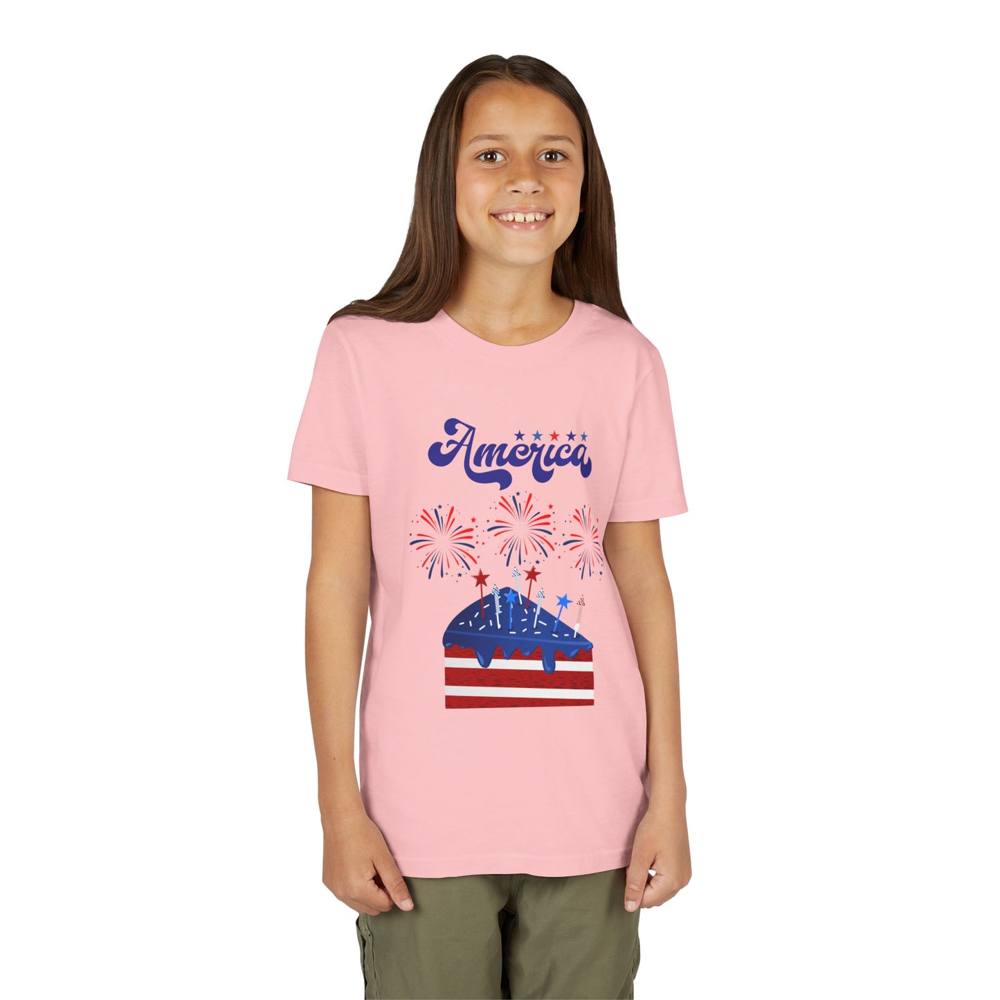 Girl wearing a Pink t-shirt with 'America' and flag design on a white background. Celebrate the 4th of July in style! This patriotic America fireworks youth tee is perfect for kids who love Independence Day festivities and summer fun.