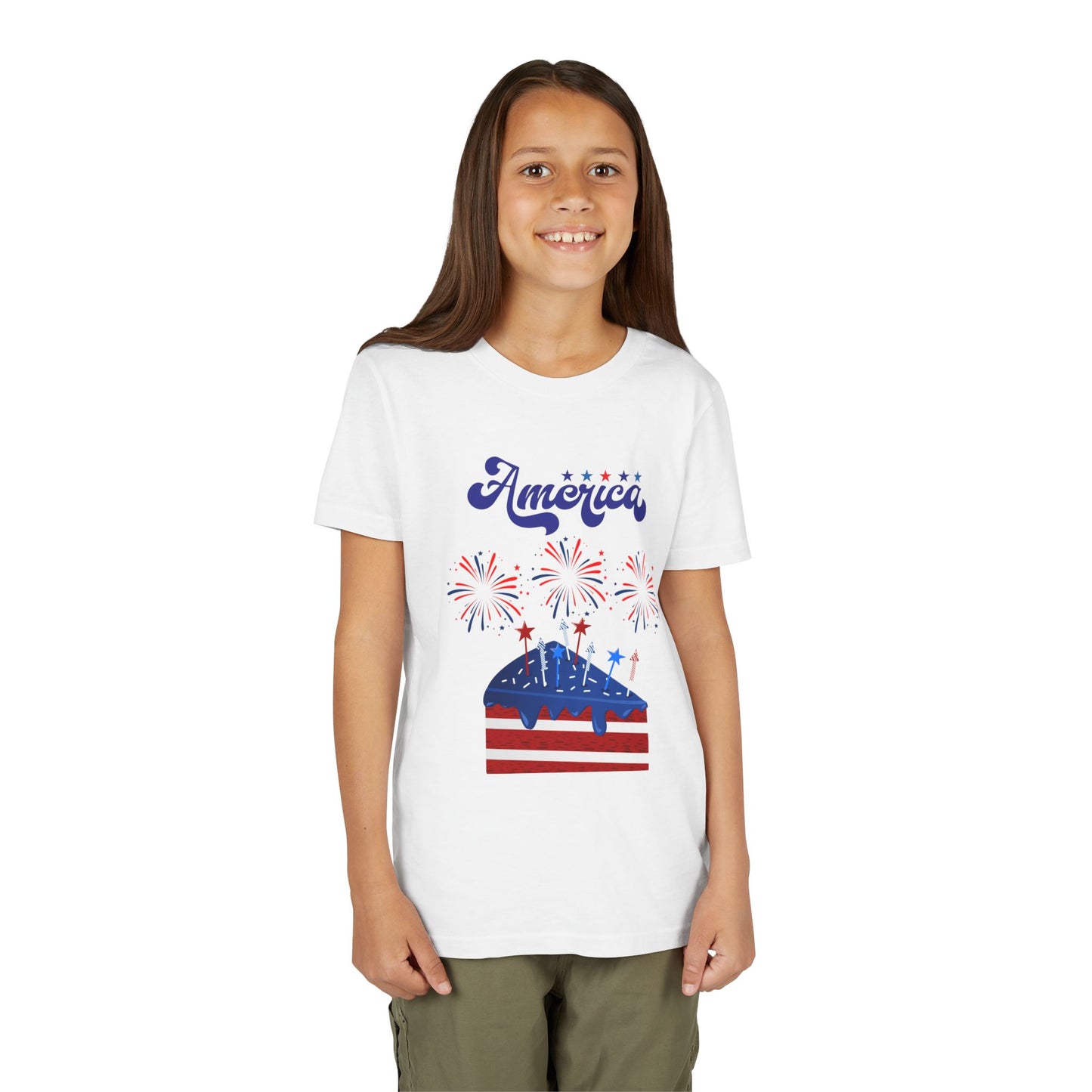 Girl wearing a White t-shirt with 'America' and a graphic design on a white background. Celebrate the 4th of July in style! This patriotic America fireworks youth tee is perfect for kids who love Independence Day festivities and summer fun.