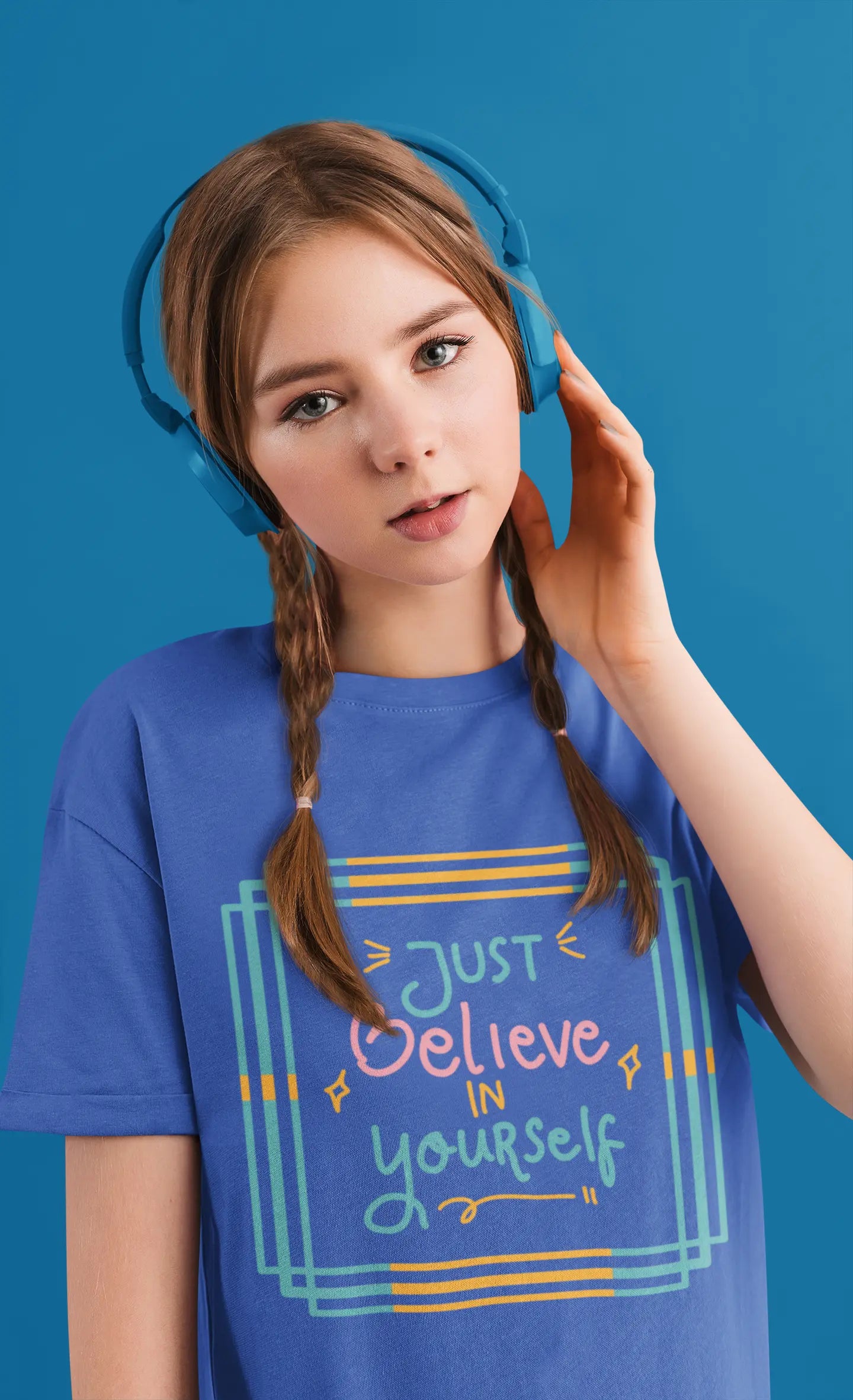 Youth wearing an encouraging youth tee with "Just Believe in Yourself" message. Soft cotton, perfect for school, everyday wear, and building confidence. Motivational kids' clothing. Heather Columbia Blue