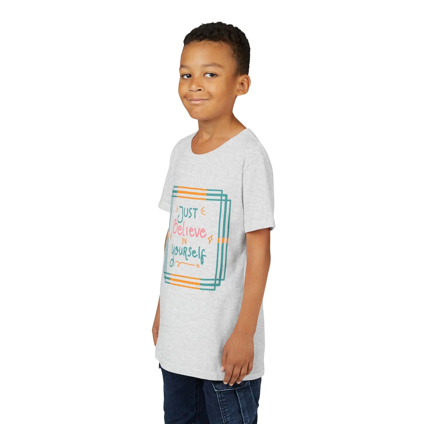 Youth wearing an encouraging youth tee with "Just Believe in Yourself" message. Soft cotton, perfect for school, everyday wear, and building confidence. Motivational kids' clothing. Ash