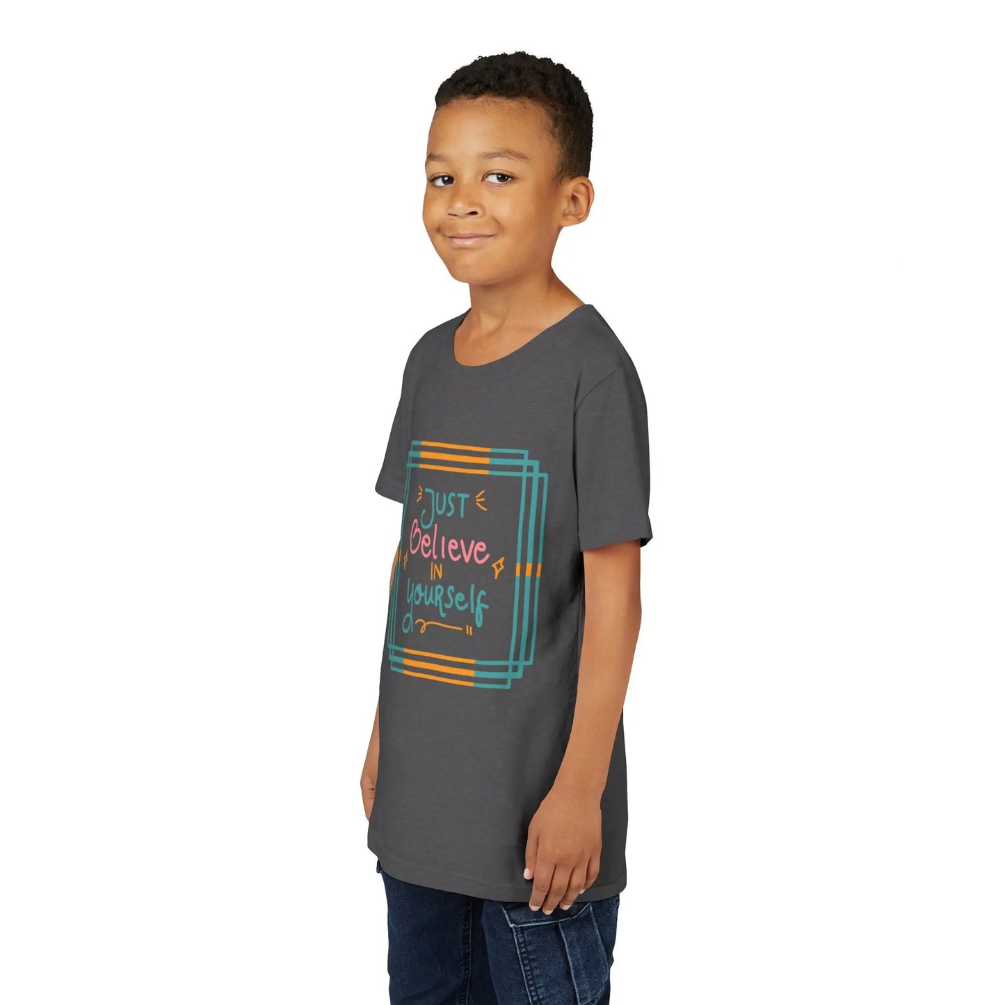 Youth wearing an encouraging youth tee with "Just Believe in Yourself" message. Soft cotton, perfect for school, everyday wear, and building confidence. Motivational kids' clothing. Dark Heather Grey