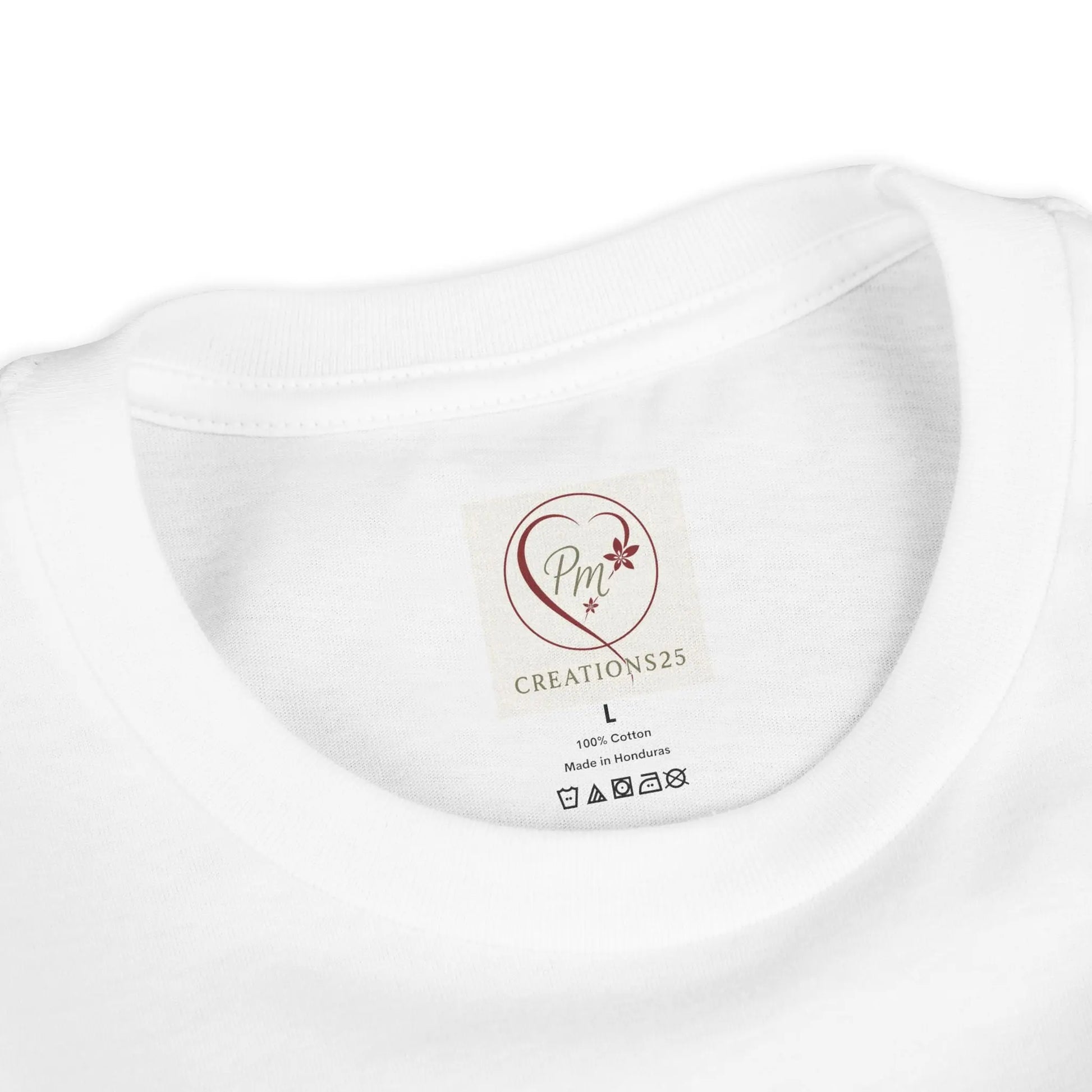 White t-shirt with a PM Creations 25 label on a white background