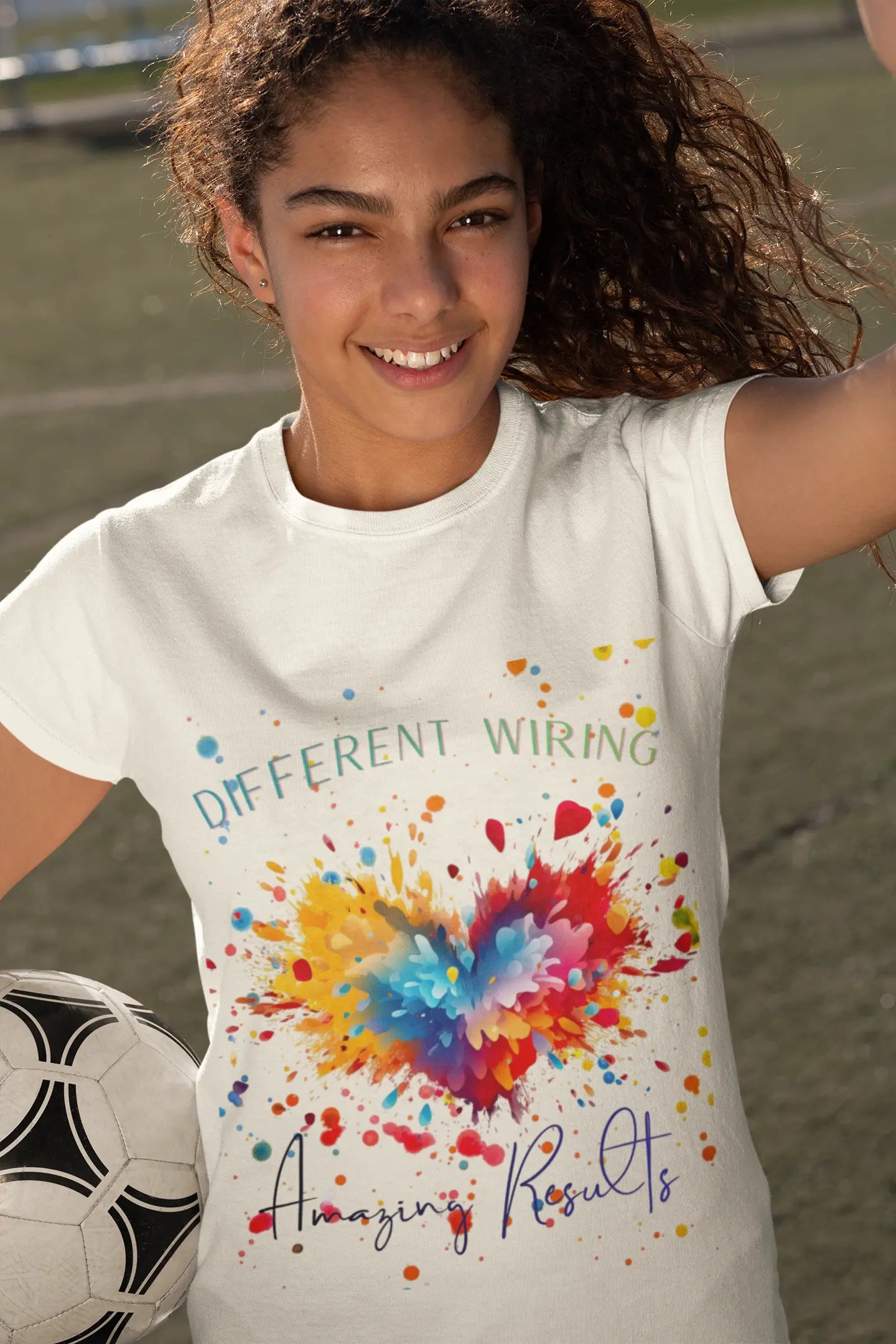Celebrates neurodiversity with this soft youth tee featuring a colorful heart design. Different wiring, amazing results. Sensory-friendly and ethically made for autism awareness. 