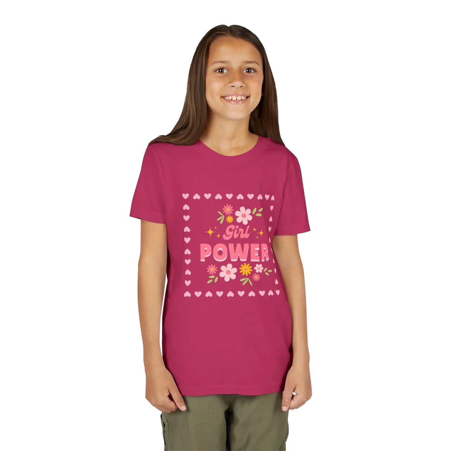 Girl wearing a Berry soft youth tee with a floral Girl Power design in pink. Lightweight Bella+Canvas, sizes S–XL. Perfect for school, playdates & gifting.