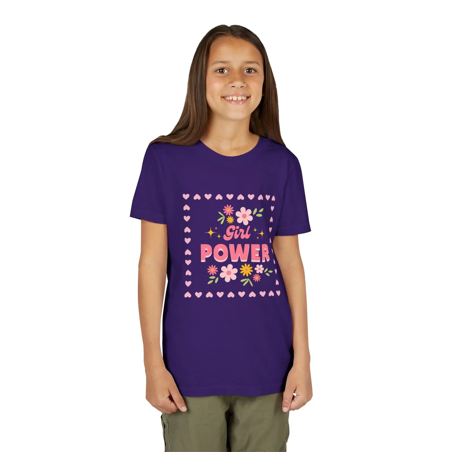 Girl wearing a Team Purple soft youth tee with a floral Girl Power design in pink. Lightweight Bella+Canvas, sizes S–XL. Perfect for school, playdates & gifting.