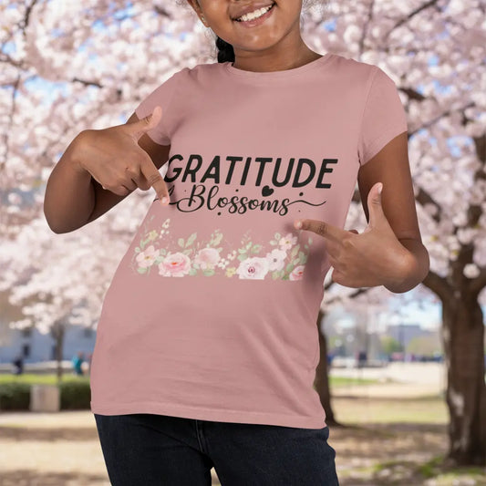 Youth wearing Gratitude Blossoms tee with hand-lettered text and watercolor floral design, Heather Mauve
