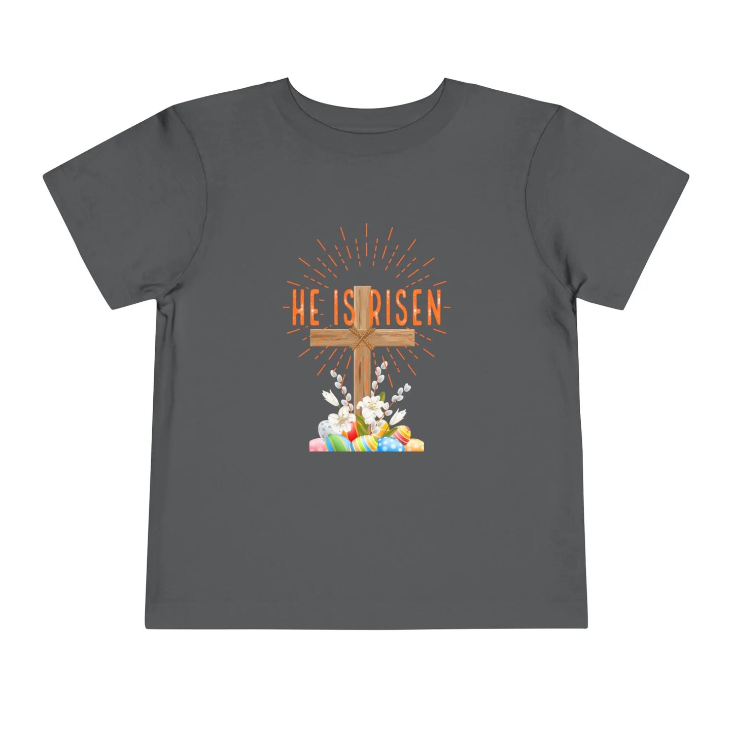 Soft toddler Easter tee with "He Is Risen" cross & pastel eggs. Perfect for church, egg hunts & family photos. Lightweight cotton for comfort & faith. Asphalt