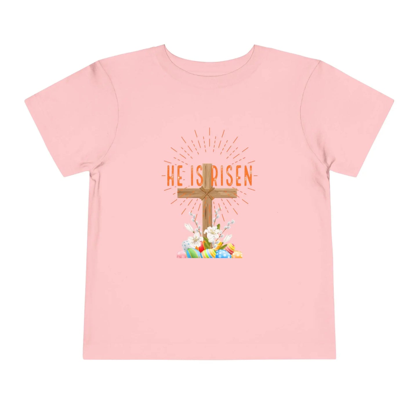 Soft toddler Easter tee with "He Is Risen" cross & pastel eggs. Perfect for church, egg hunts & family photos. Lightweight cotton for comfort & faith. Pink