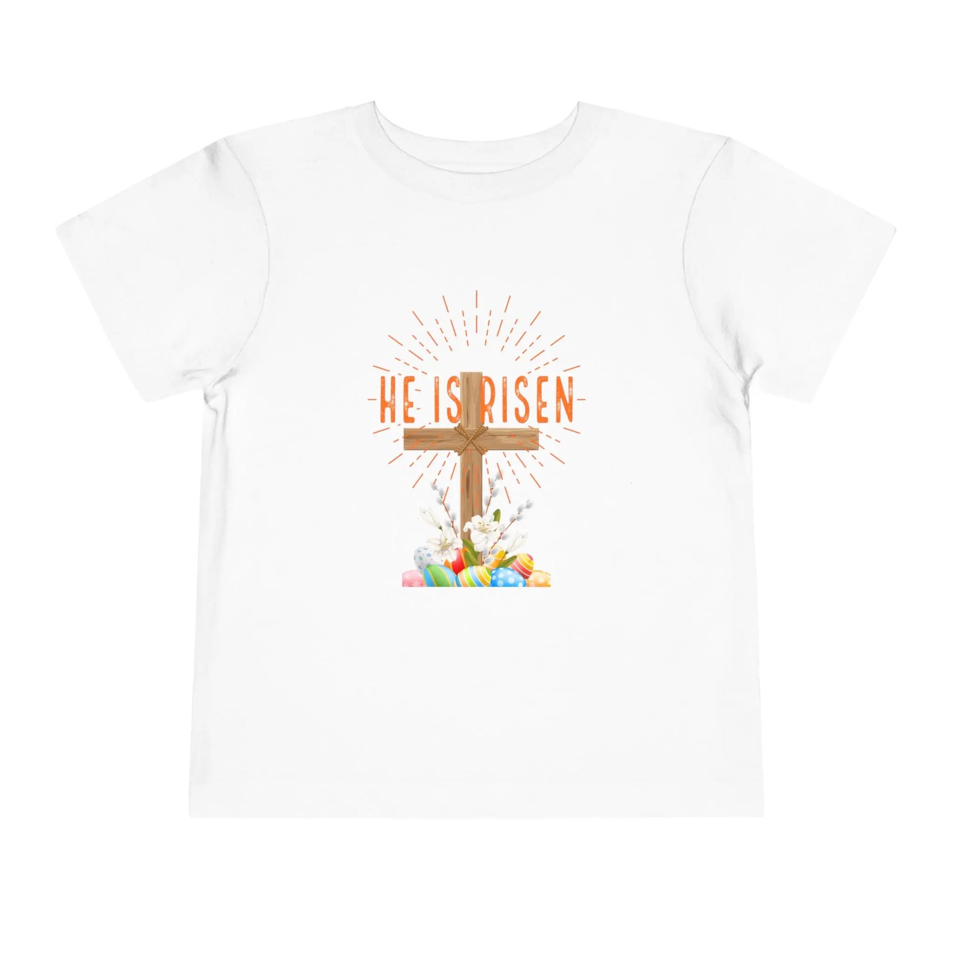 Soft toddler Easter tee with "He Is Risen" cross & pastel eggs. Perfect for church, egg hunts & family photos. Lightweight cotton for comfort & faith. White