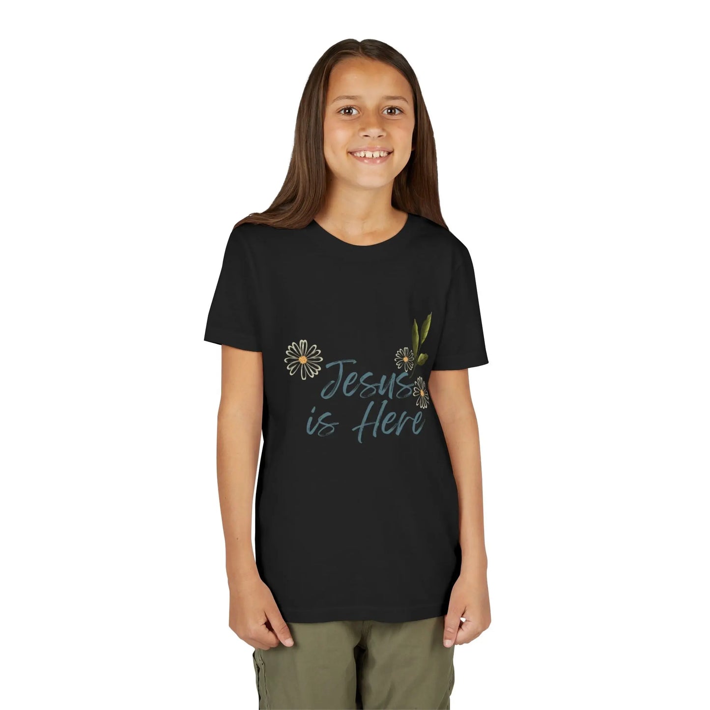 A soft, floral "Jesus is Here" youth Christian tee — a gentle reminder of God's presence for little ones. Perfect for church, Sunday school, baptisms, and everyday faith wear. Black