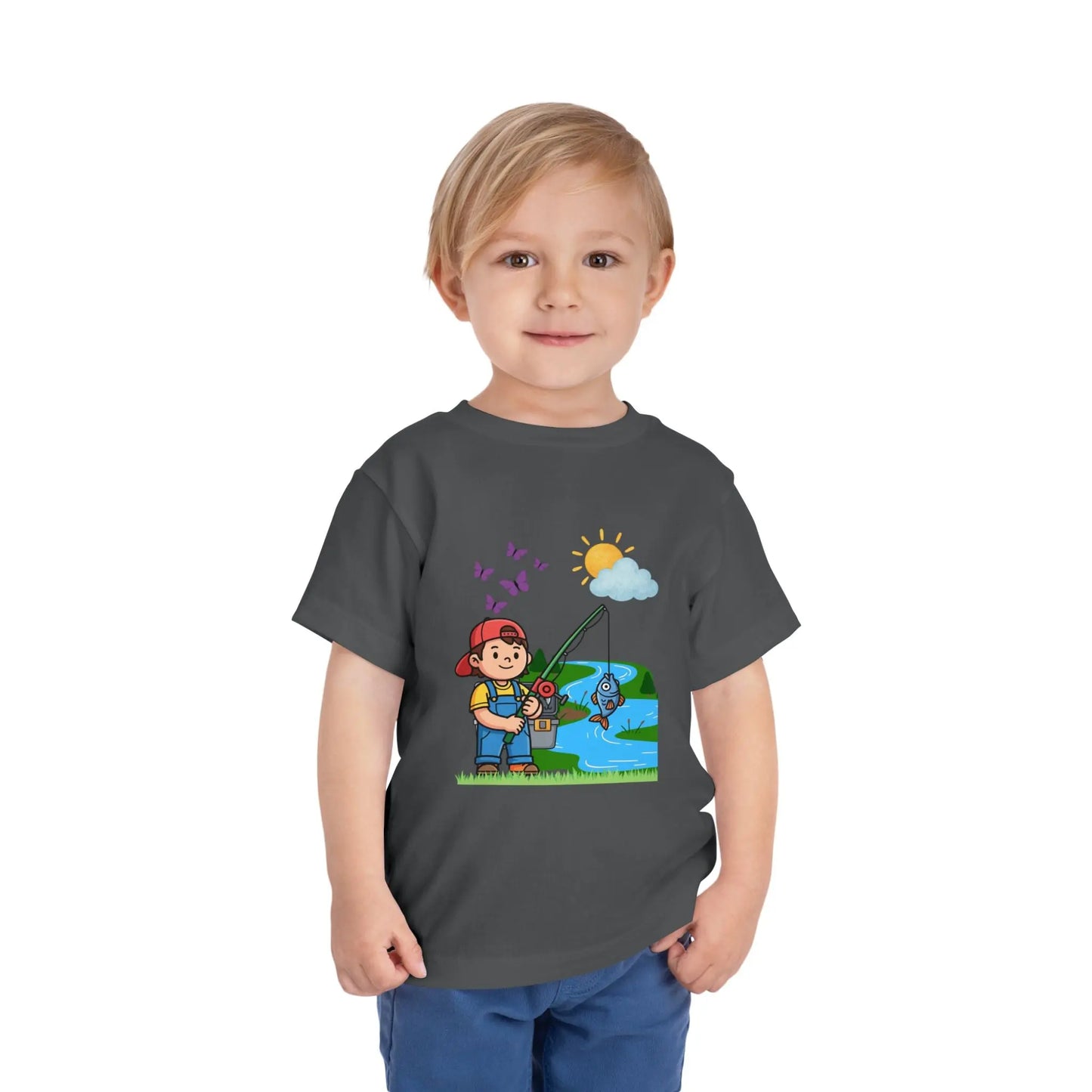 Cute kid fishing toddler tee with a fun outdoor graphic. Soft cotton, sizes 2T–5T. Perfect for little anglers, lake days & nature-loving kids. Asphalt