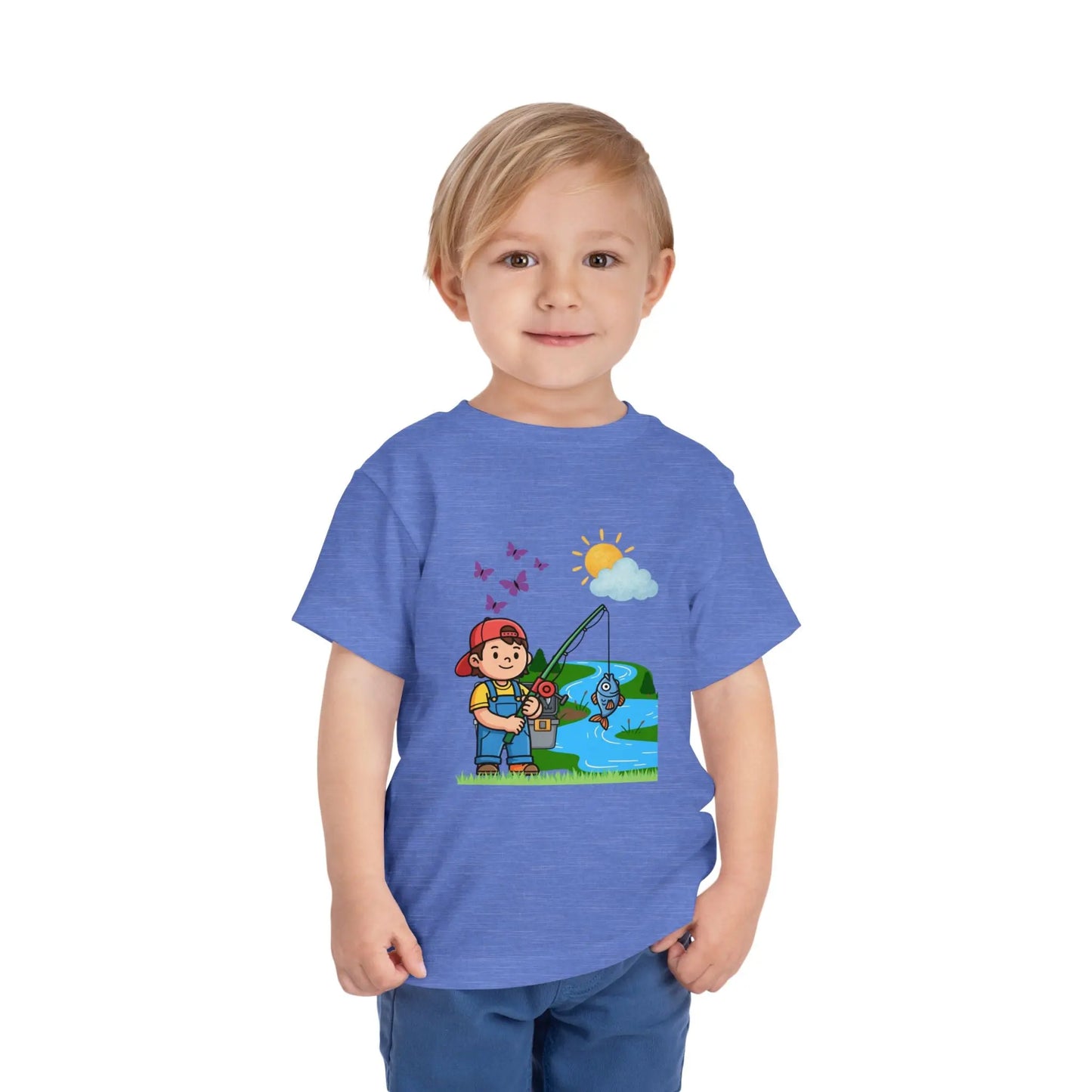 Cute kid fishing toddler tee with a fun outdoor graphic. Soft cotton, sizes 2T–5T. Perfect for little anglers, lake days & nature-loving kids. Heather Columbia Blue