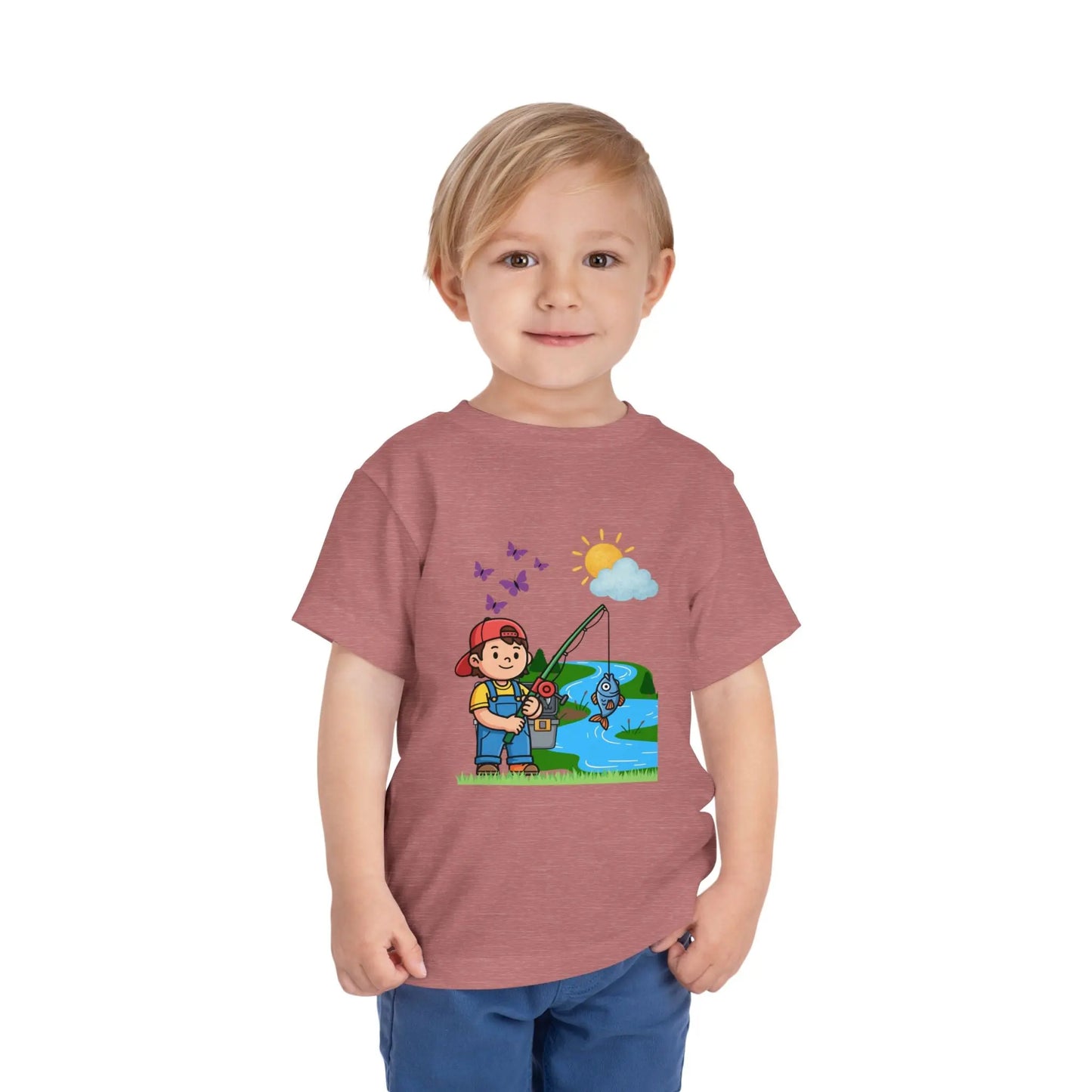 Cute kid fishing toddler tee with a fun outdoor graphic. Soft cotton, sizes 2T–5T. Perfect for little anglers, lake days & nature-loving kids. Heather Mauve