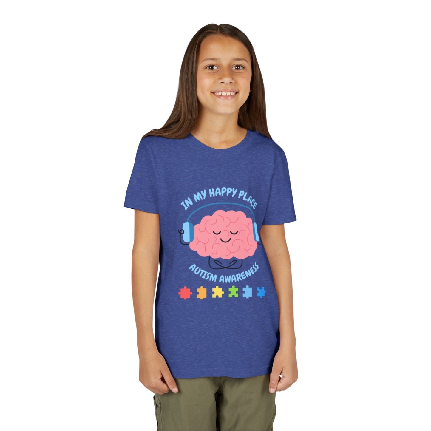 Girl wearing a youth tee for Autism Awareness with smiling brain with headphones and colorful puzzle pieces, "In My Happy Place" graphic. Heather Navy Blue