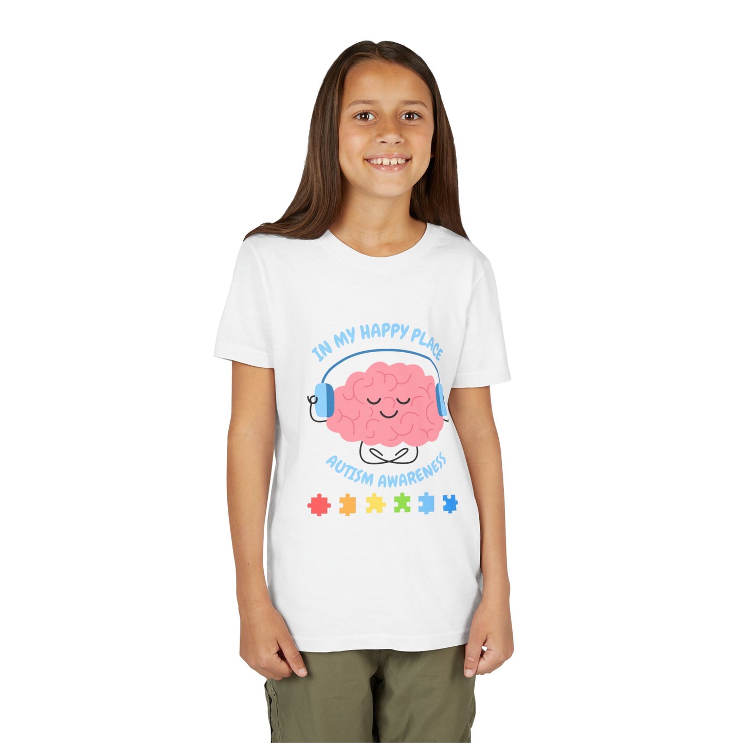 Girl wearing a youth tee for Autism Awareness with smiling brain with headphones and colorful puzzle pieces, "In My Happy Place" graphic. White