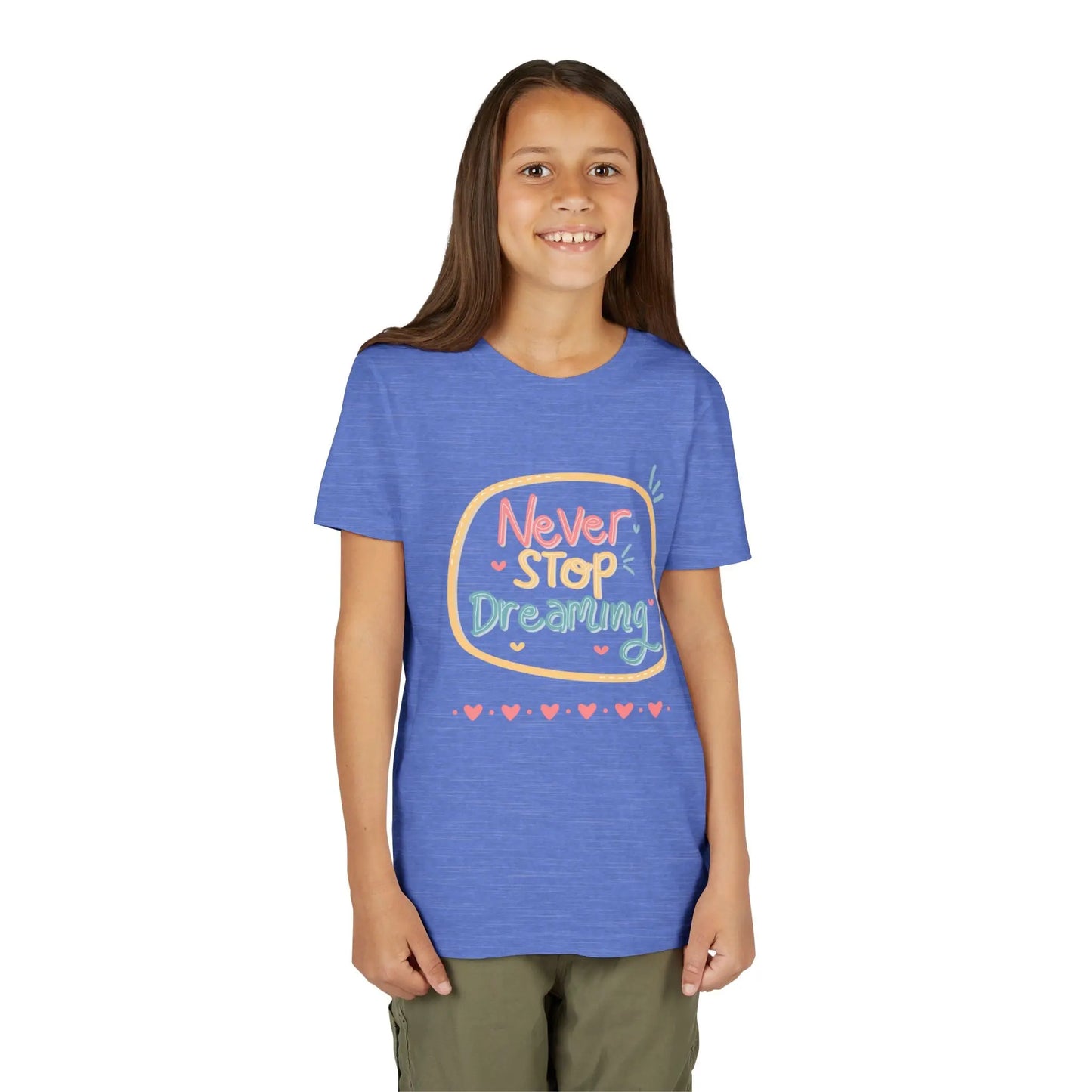 Youth wearing this encouraging youth tee with "Never Stop Dreaming" message. Soft cotton, perfect for school, everyday wear, and inspiring creativity. Motivational kids' clothing. Heather Columbia Blue
