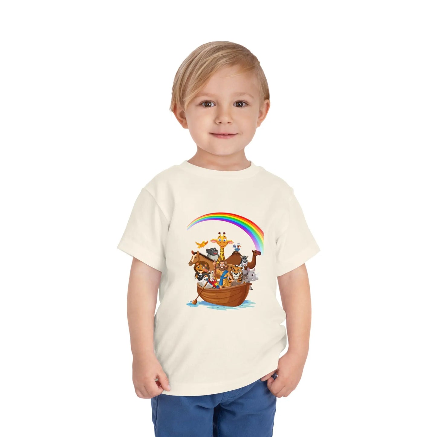 Child wearing an Natural toddler t-shirt with an Adorable Noah's Ark with animals, rainbow & ark print. Soft cotton, sizes 2T–5T. Perfect Christian kids gift or Bible story outfit.