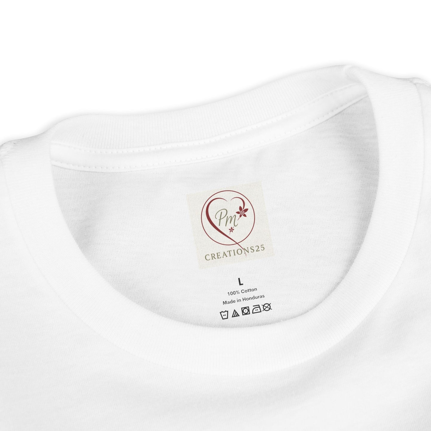 White t-shirt with a PM Creations 25 label on a white background