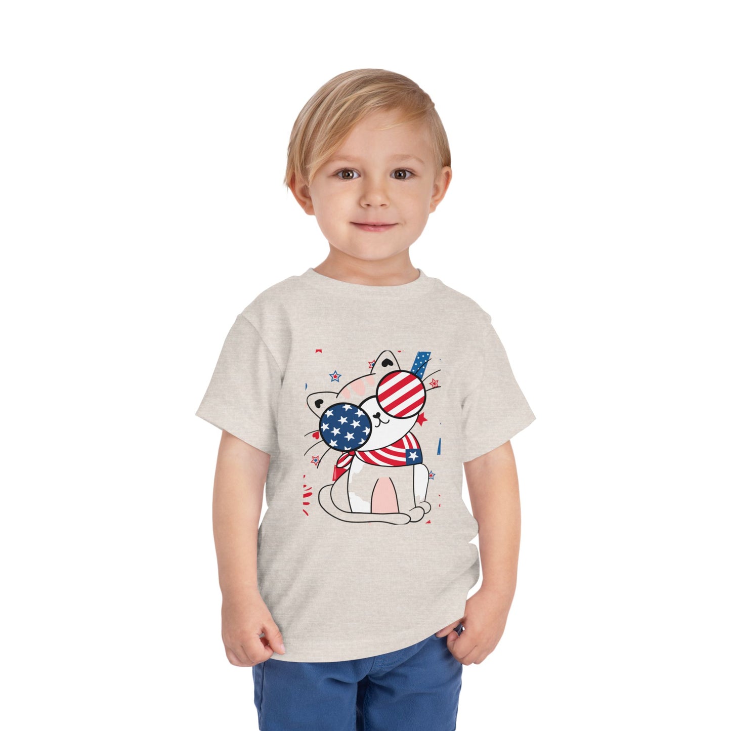 Adorable patriotic cat with USA sunglasses tee for toddlers 2T–5T. A fun, festive 4th of July shirt kids will love for summer celebrations. Heather Stone