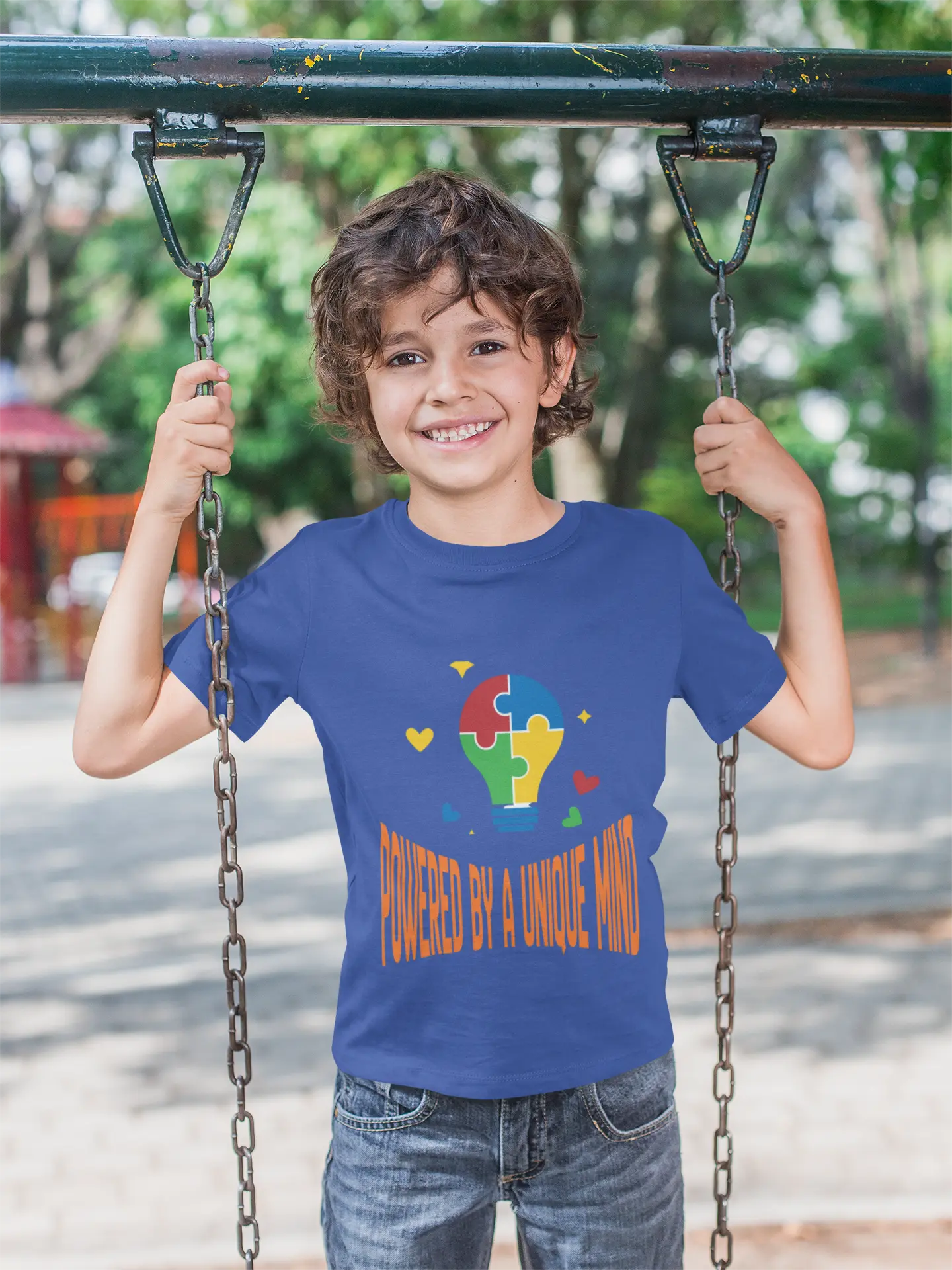  Celebrate neurodiversity with this "Powered by a Unique Mind" autism toddler tee. Featuring a puzzle lightbulb design, it's a sweet autism awareness shirt for little ones.