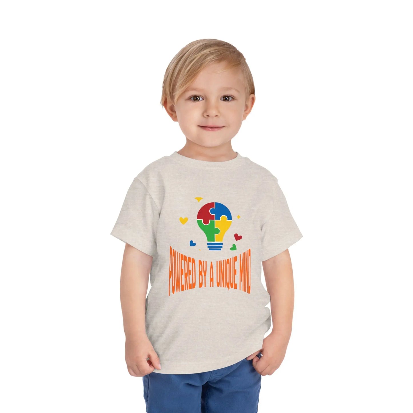  Celebrate neurodiversity with this "Powered by a Unique Mind" autism toddler tee. Featuring a puzzle lightbulb design, it's a sweet autism awareness shirt for little ones. Heather Dust