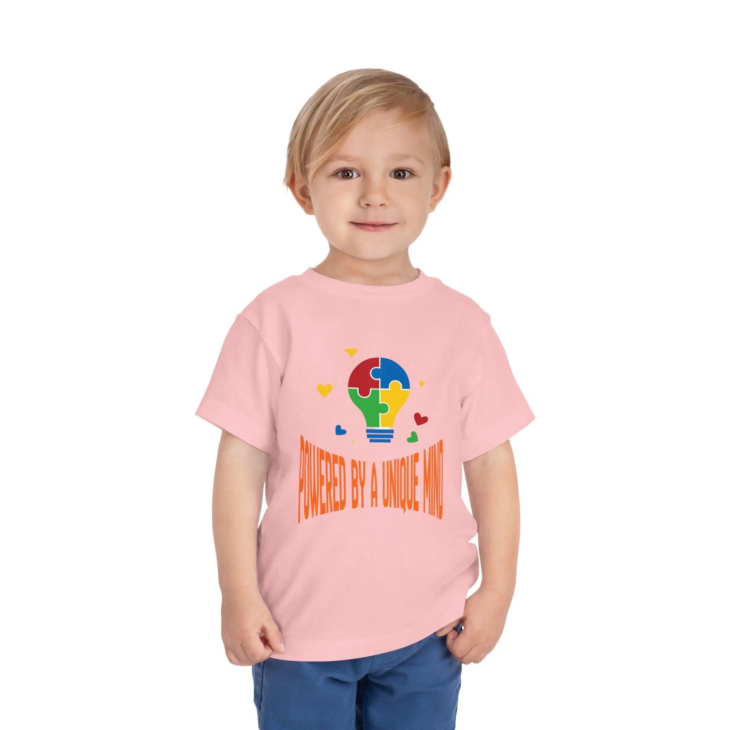  Celebrate neurodiversity with this "Powered by a Unique Mind" autism toddler tee. Featuring a puzzle lightbulb design, it's a sweet autism awareness shirt for little ones. Pink