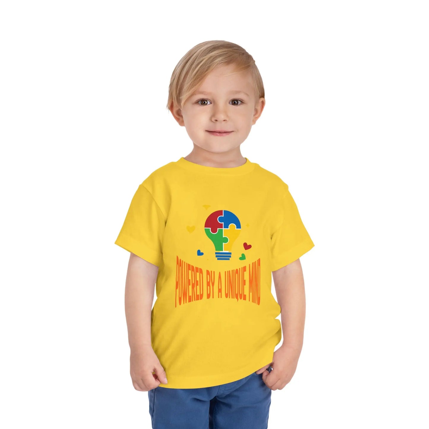  Celebrate neurodiversity with this "Powered by a Unique Mind" autism toddler tee. Featuring a puzzle lightbulb design, it's a sweet autism awareness shirt for little ones. Yellow