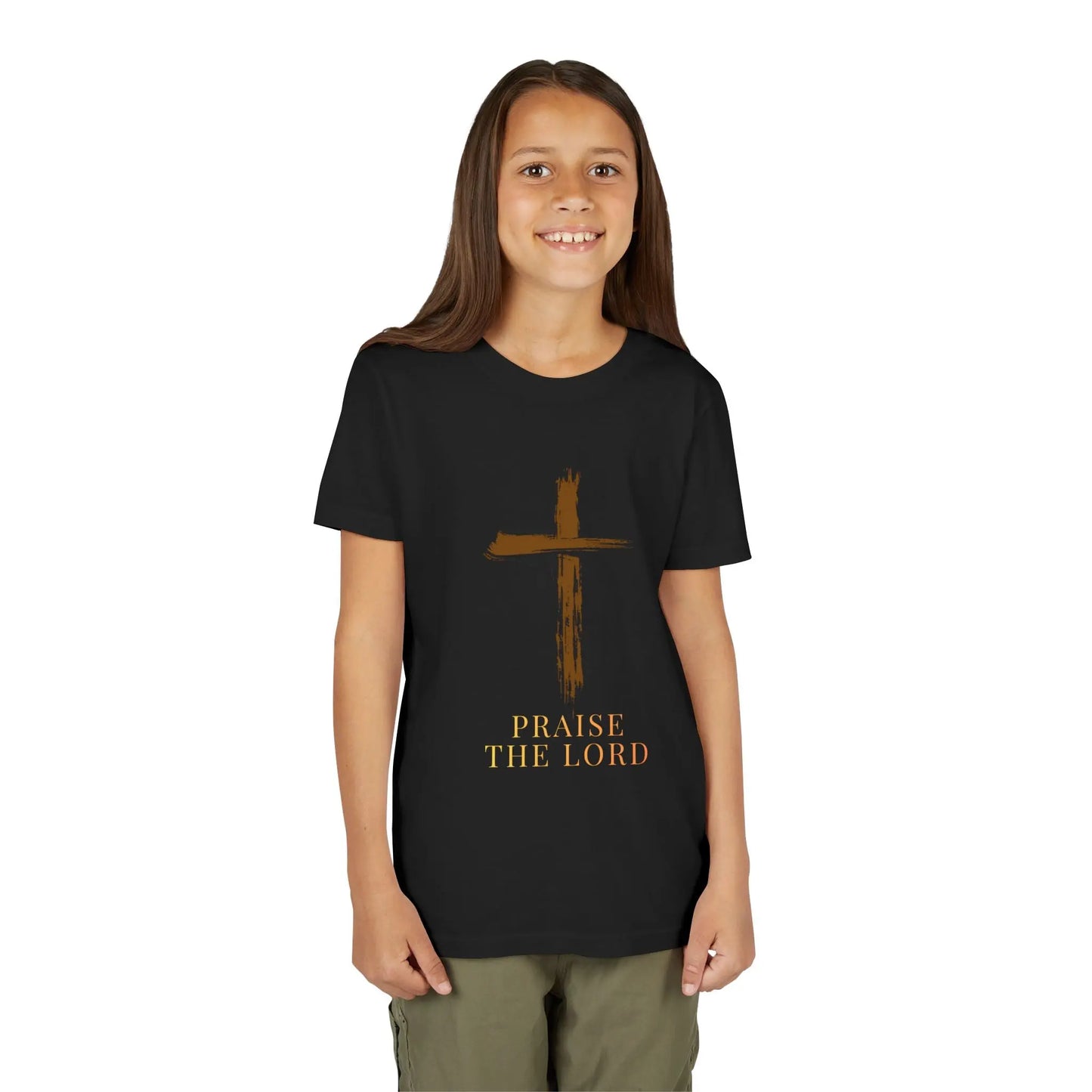 Young girl wearing a soft, faith-inspired youth tee featuring a painterly brushstroke cross and "Praise The Lord." Perfect for church, Sunday school, Easter, and everyday Christian wear. Black