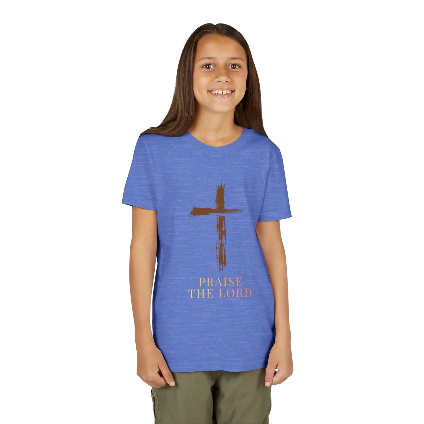 Girl wearing a Girl wearing a soft, faith-inspired youth tee featuring a painterly brushstroke cross and "Praise The Lord." Perfect for church, Sunday school, Easter, and everyday Christian wear. Heather Columbia Blue