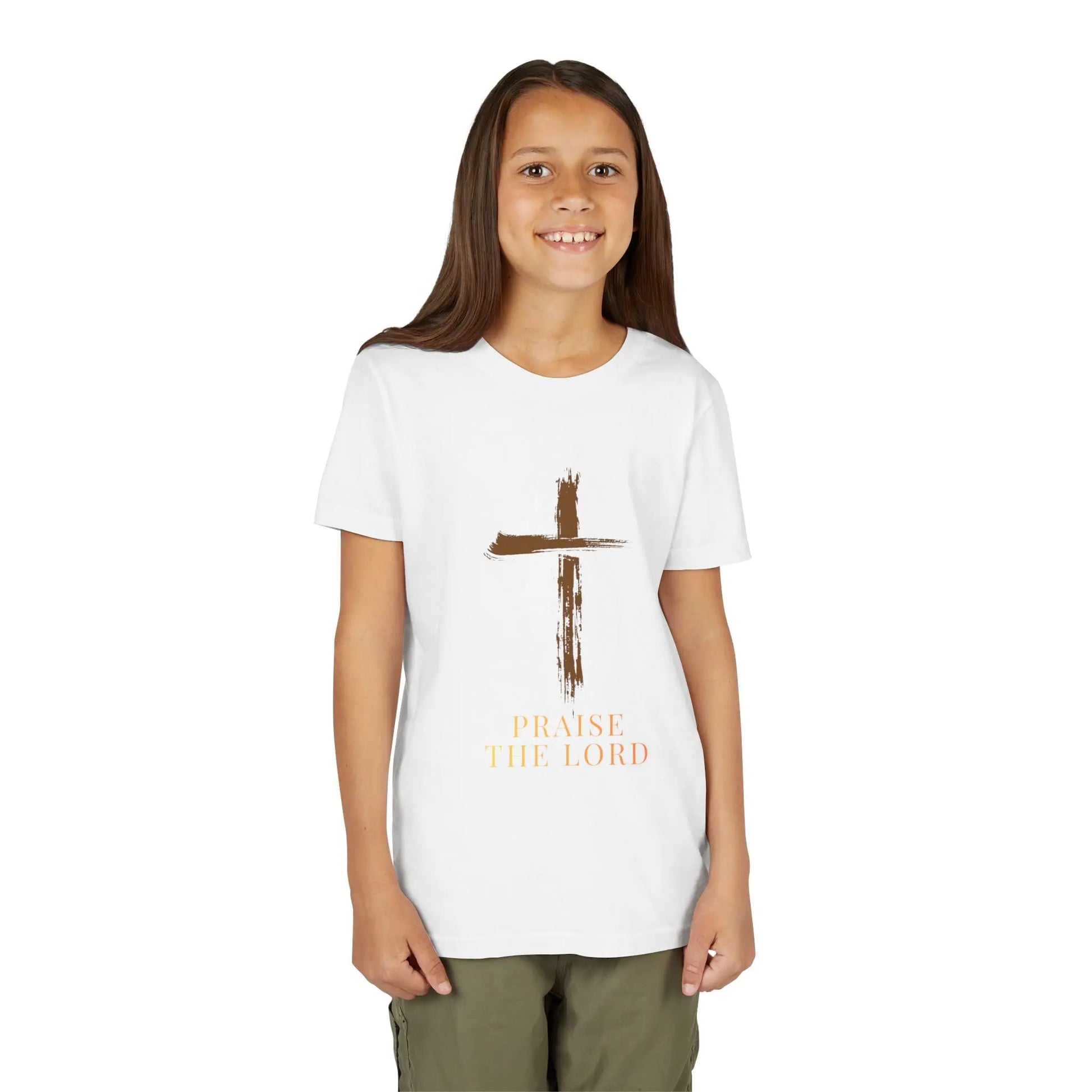  Girl wearing a soft, faith-inspired youth tee featuring a painterly brushstroke cross and "Praise The Lord." Perfect for church, Sunday school, Easter, and everyday Christian wear.  White