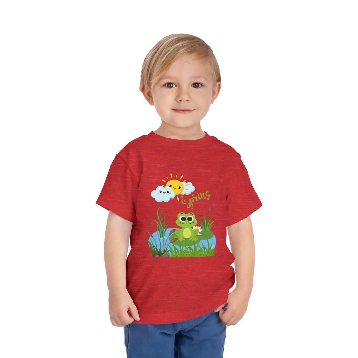Toddler wearing an adorable toddler tee with spring frog pond graphic. Soft cotton, perfect for Easter, spring outfits, and playful adventures. Cute kids' clothing for toddlers. Heather Red