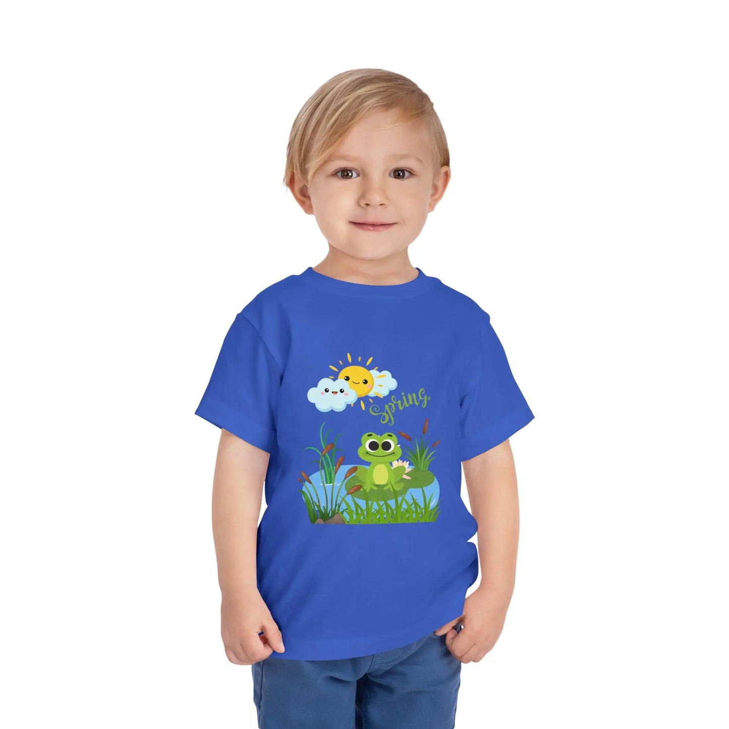 Toddler wearing an adorable toddler tee with spring frog pond graphic. Soft cotton, perfect for Easter, spring outfits, and playful adventures. Cute kids' clothing for toddlers. True Royal