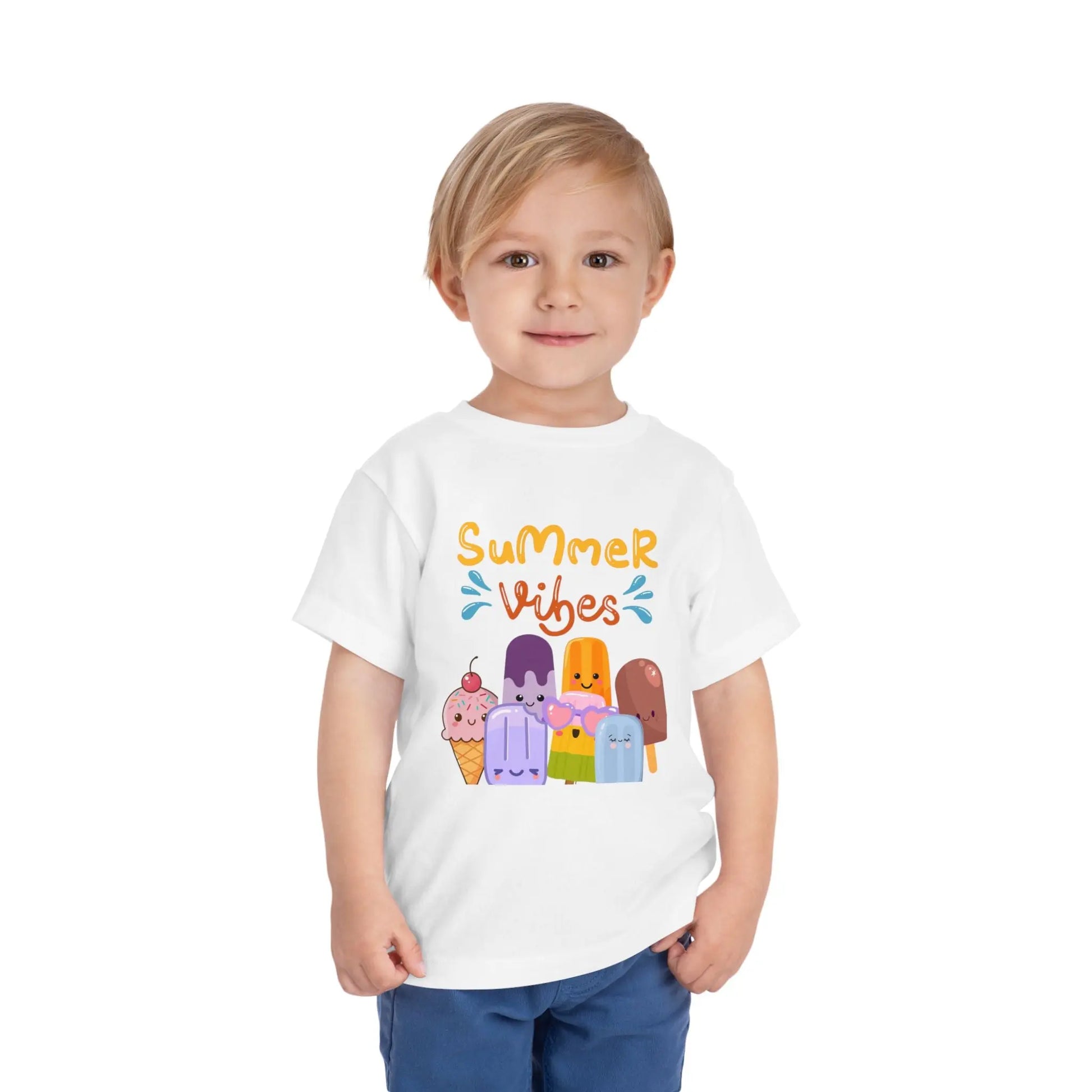 Toddler wearing a soft toddler tee with a cheerful popsicle & ice cream Summer Vibes design. Lightweight cotton, sizes 2T–5T. Perfect for summer outings & gifting. White