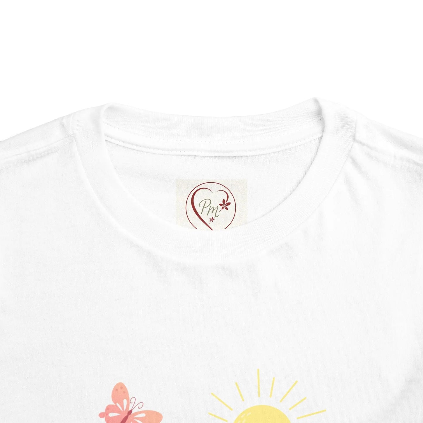  White t-shirt with a heart-shaped PM Creations 25 logo and butterfly design on a white background