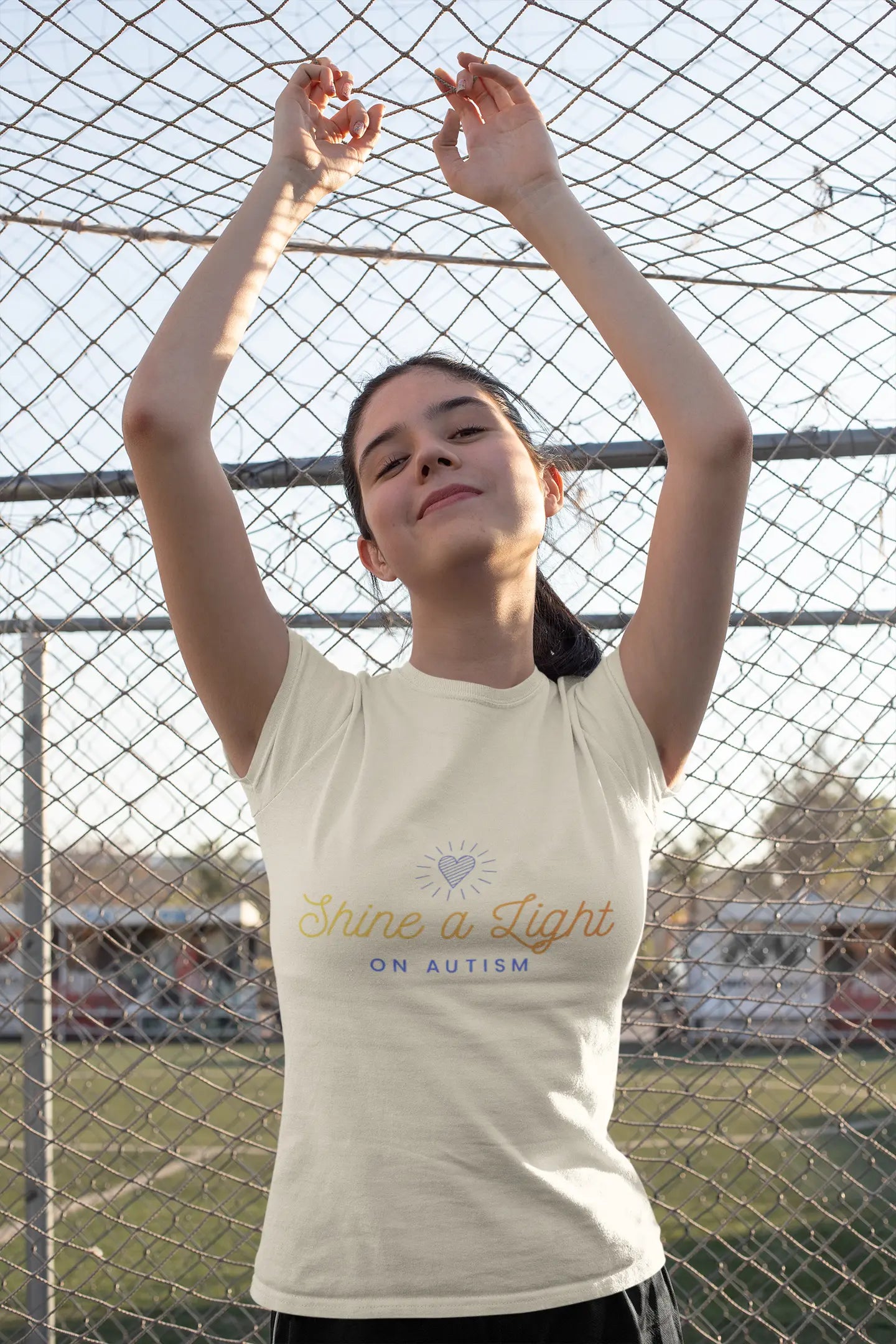 Help kids shine a light on autism with this soft pastel awareness youth tee — a meaningful, wearable statement of acceptance and support for April and every day.