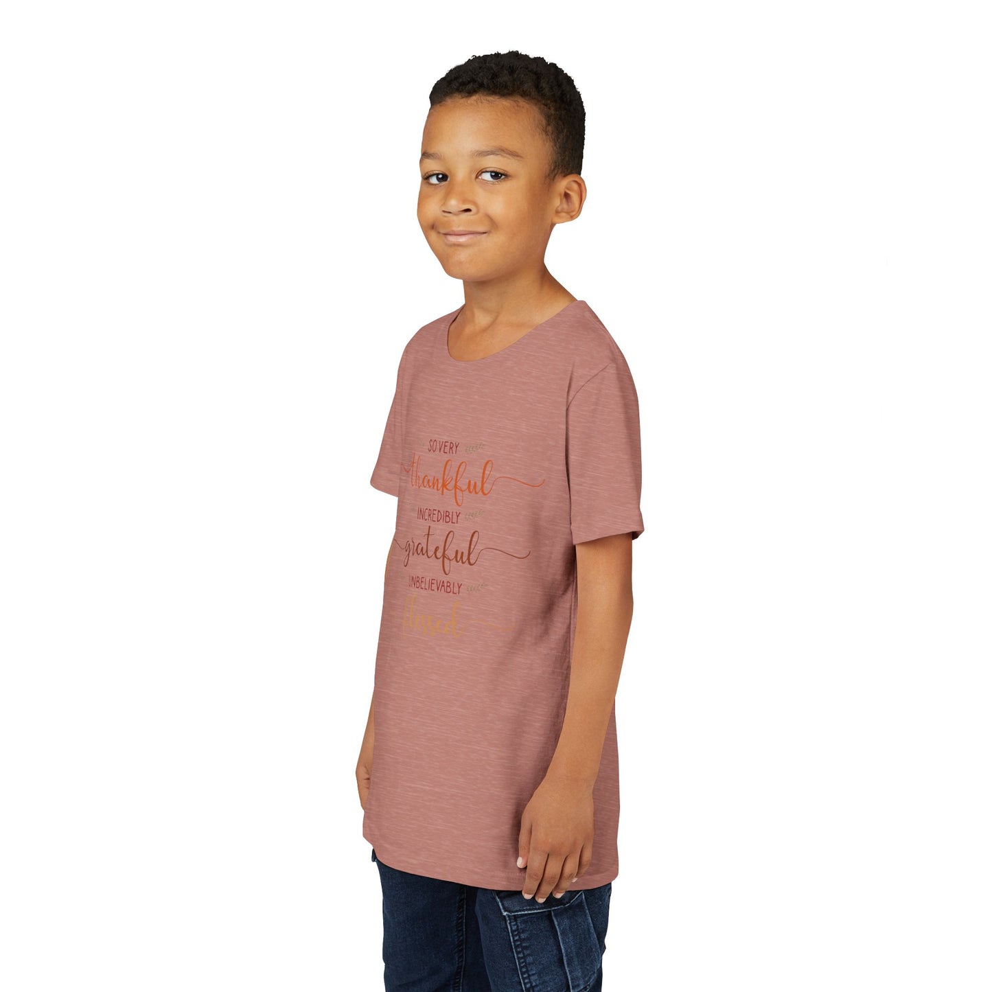 Youth wearing a heartfelt youth tee with "Thankful, Grateful, Blessed" message. Soft cotton, perfect for Thanksgiving, family photos, and everyday gratitude. Inspirational kids' clothing. Heather Mauve